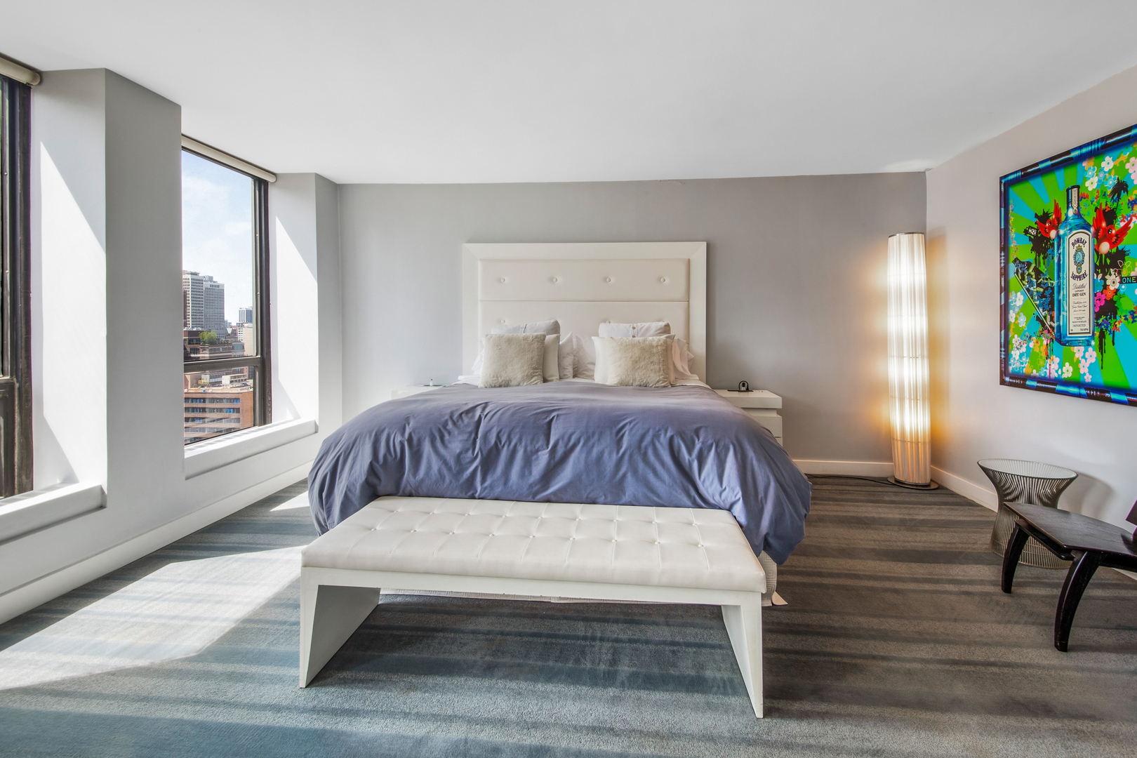 260 East Chestnut Street, Unit 2701 Chicago, IL 60611 - Photo 25 of 38 a bedroom with a bed and a window