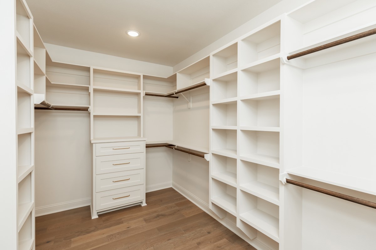 6560 Brayfield Lane Beaumont, TX 77706 - Photo 21 of 38 a view of walk in closet with empty racks