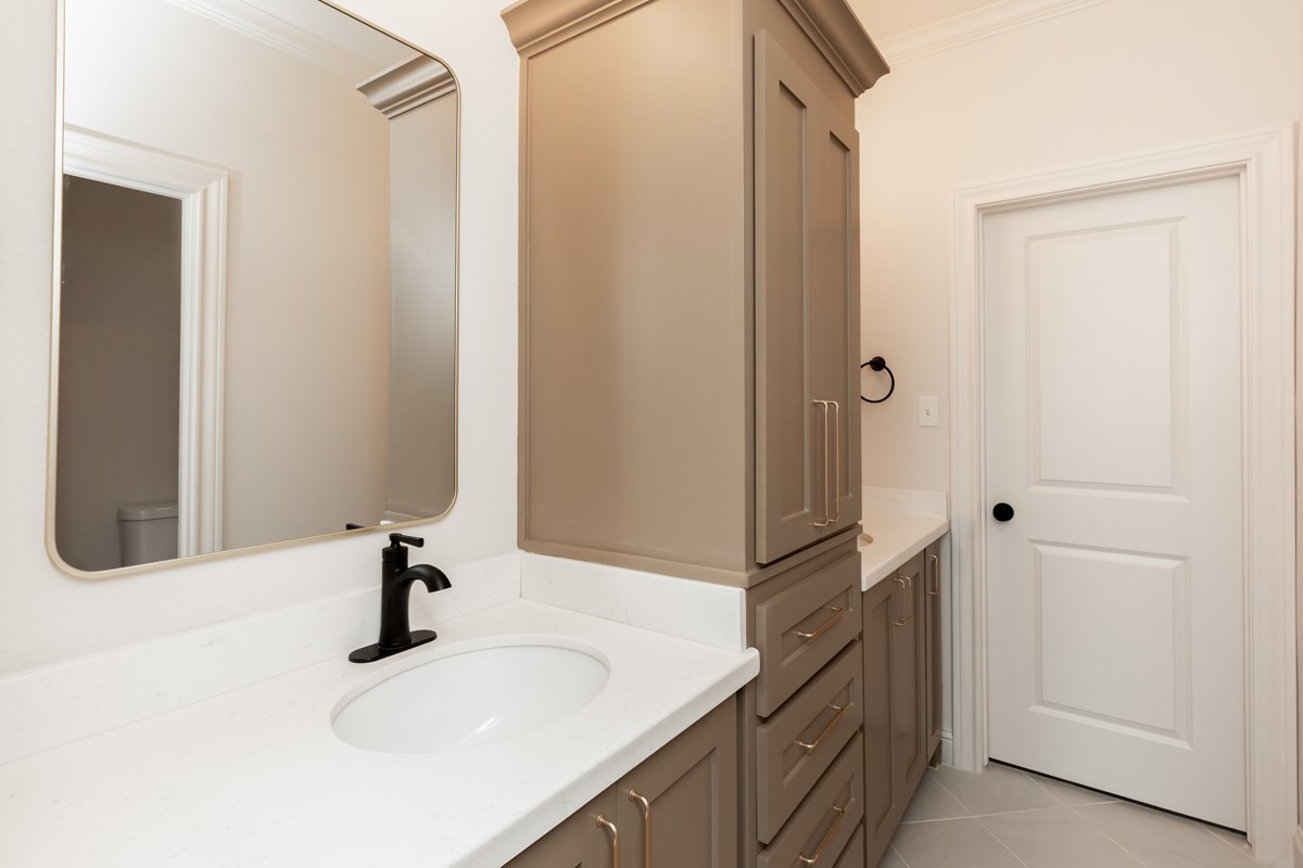 6560 Brayfield Lane Beaumont, TX 77706 - Photo 31 of 38 a bathroom with a sink and a mirror