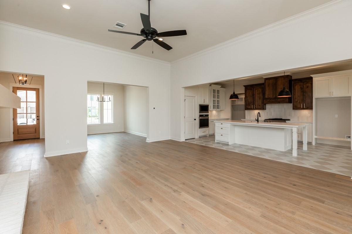 6560 Brayfield Lane Beaumont, TX 77706 - Photo 8 of 38 a view of empty room with wooden floor and window