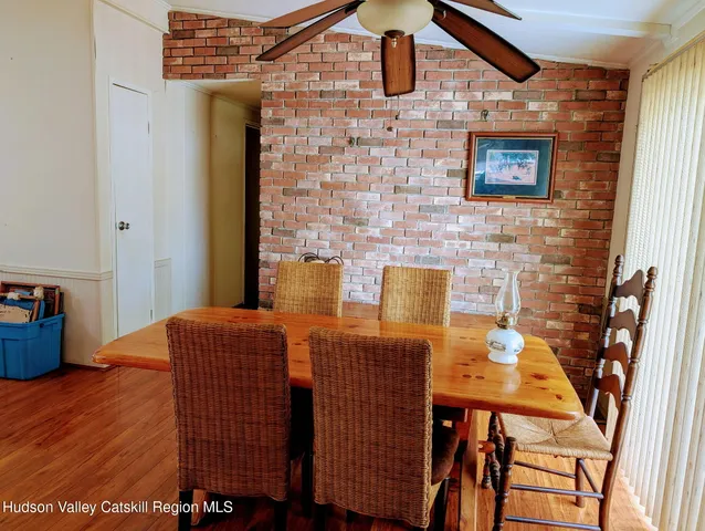 a view of a dining room with furniture