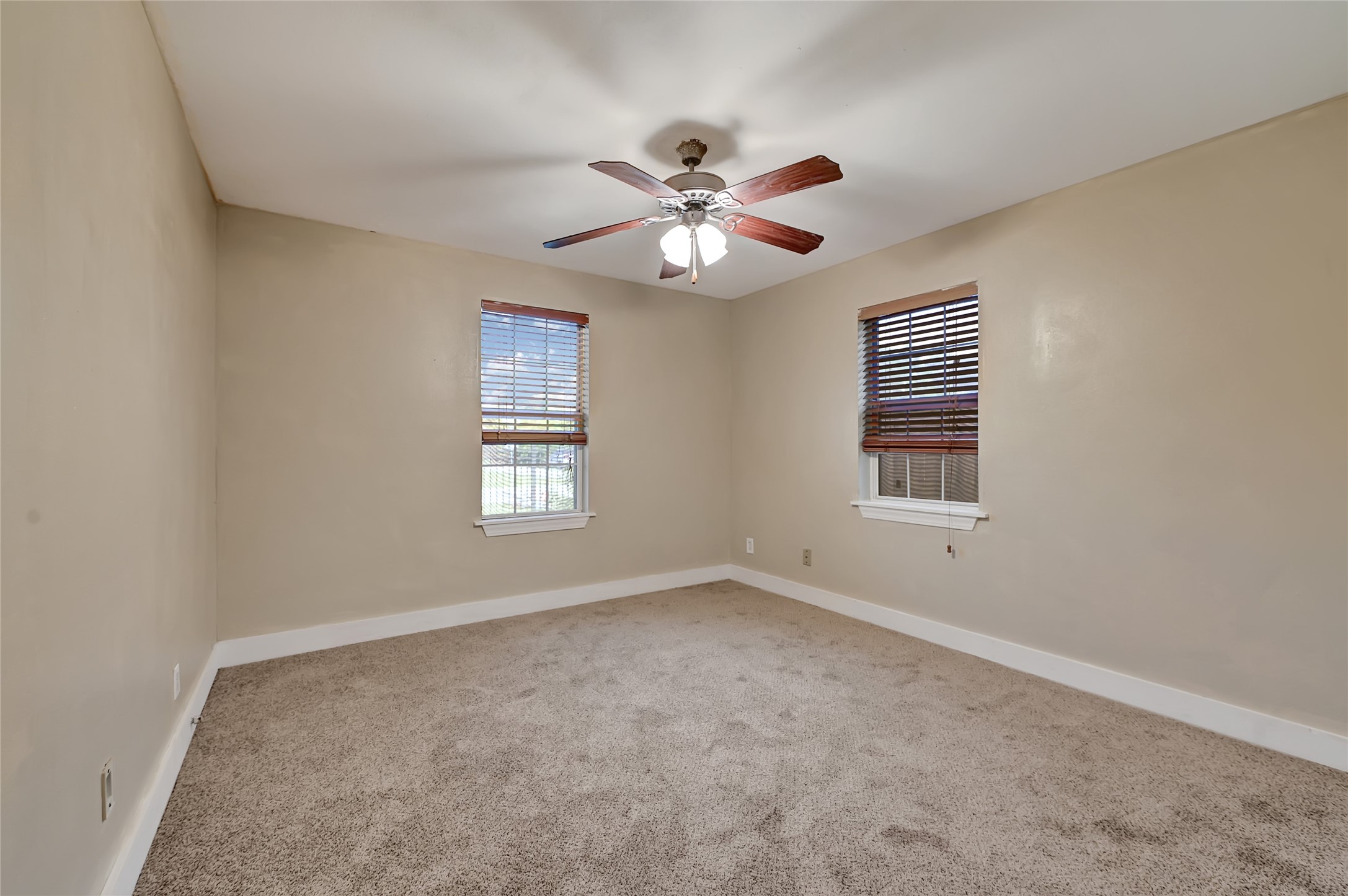 6825 Appleton Street Houston, TX 77022 - Photo 15 of 25 a view of an empty room with a window