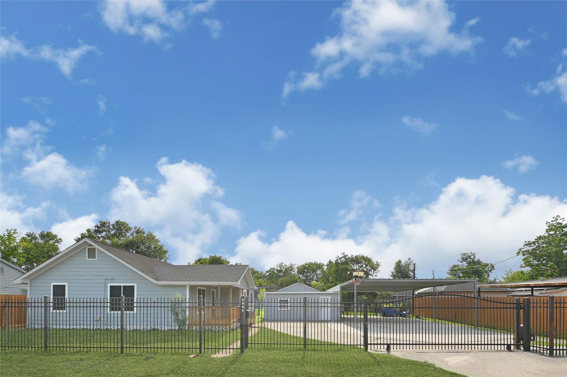 6825 Appleton Street Houston, TX 77022 - Photo 3 of 25 a view of a house with a big yard