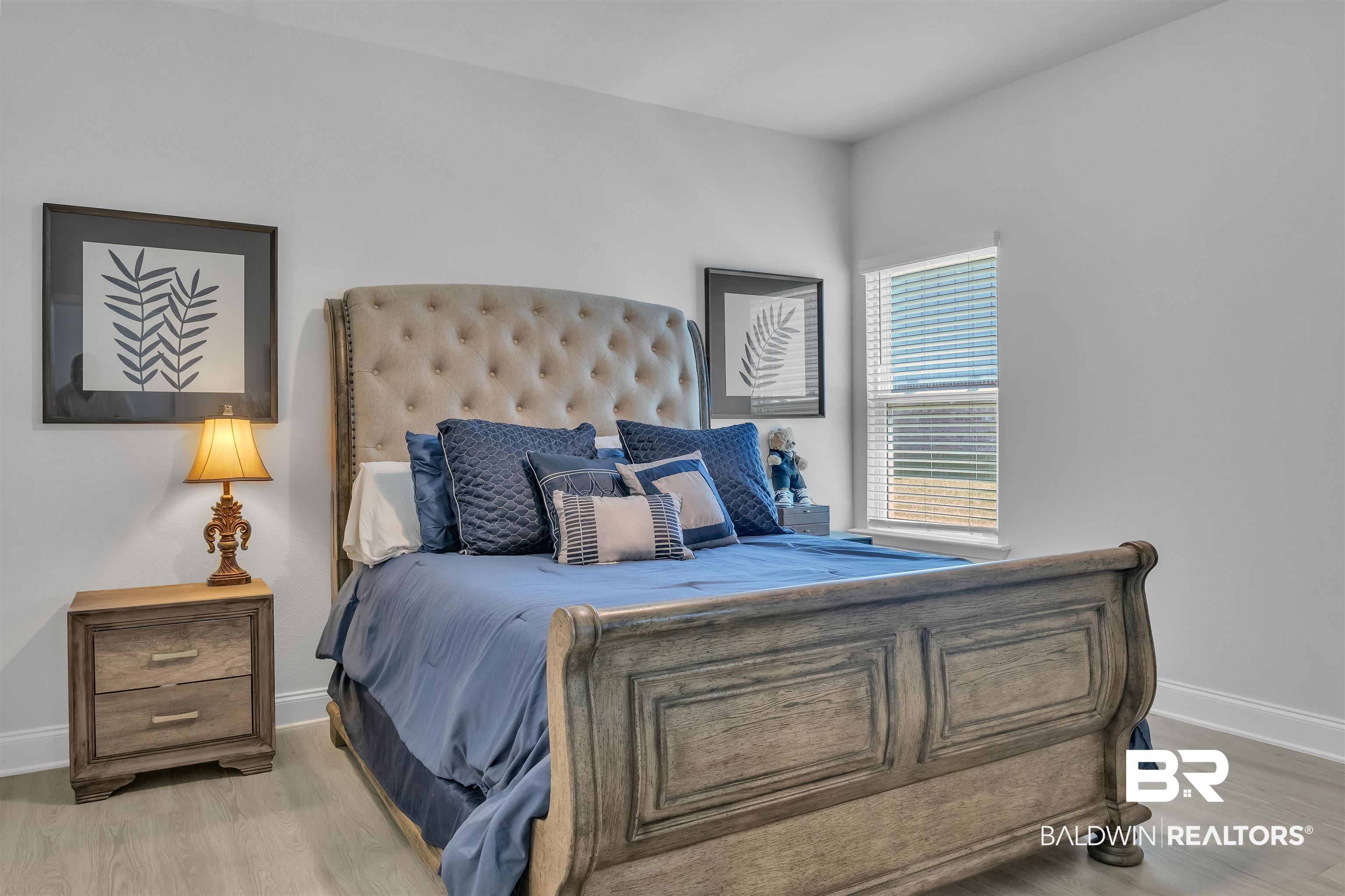 27862 Jade Court Daphne, AL 36526 - Photo 24 of 33 Bedroom featuring baseboards and wood finished floors