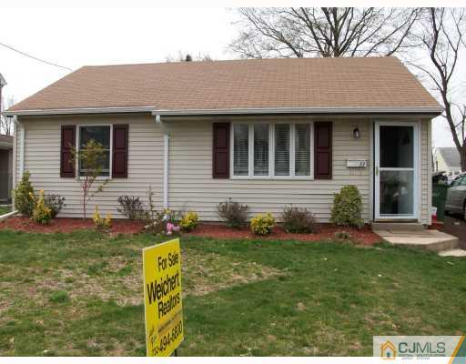 33 West Knollwood Road Edison, NJ 08817 - Photo 1 of 9 front view of a house with a yard