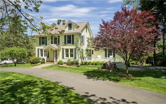 126 Ramapoo Road Ridgefield, CT 06877 - Photo 1 of 1 front view of a house with a yard