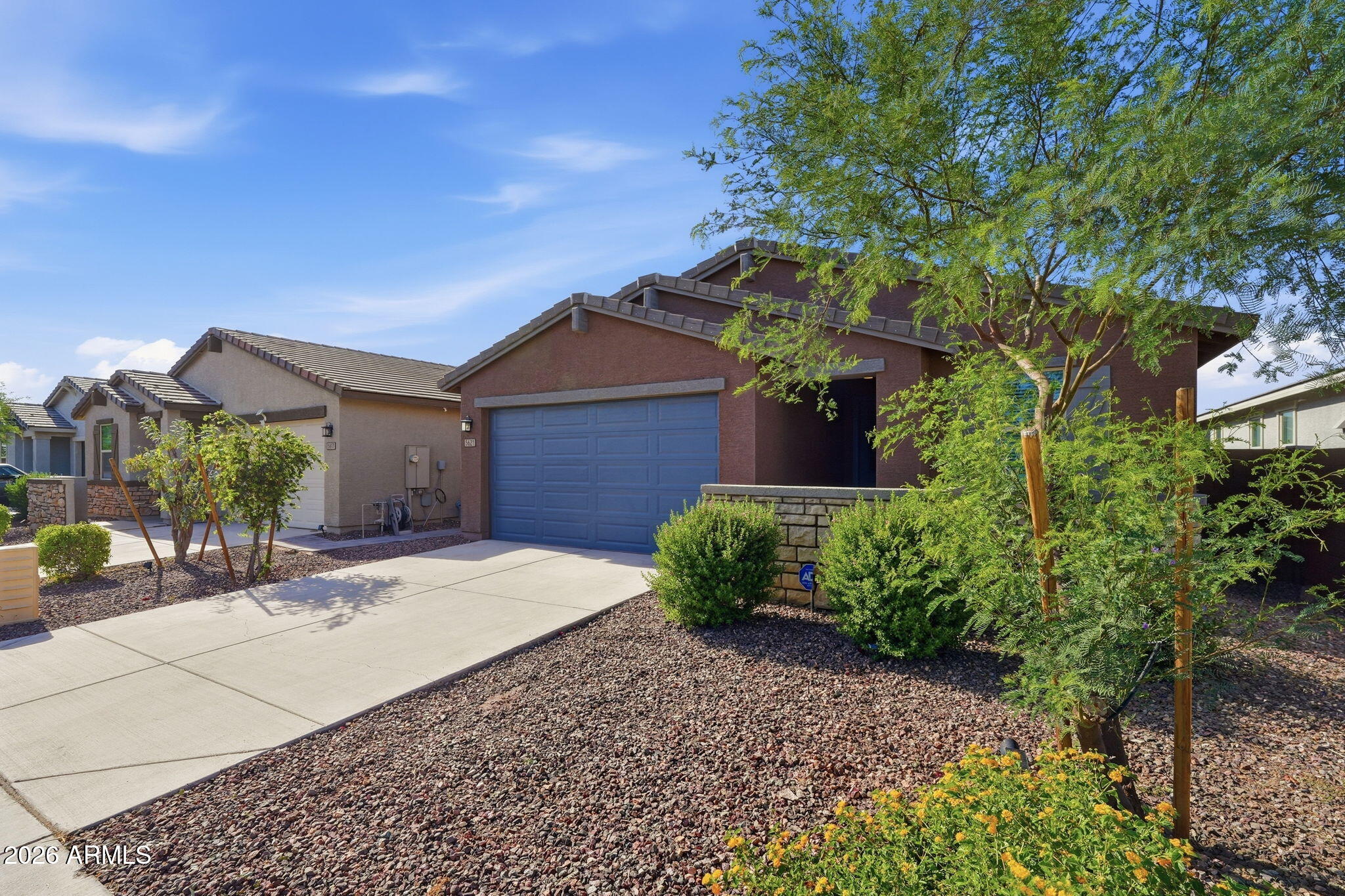 5621 West Notch Hill Road Laveen, AZ 85339 - Photo 2 of 49 a house with a tree in front of it