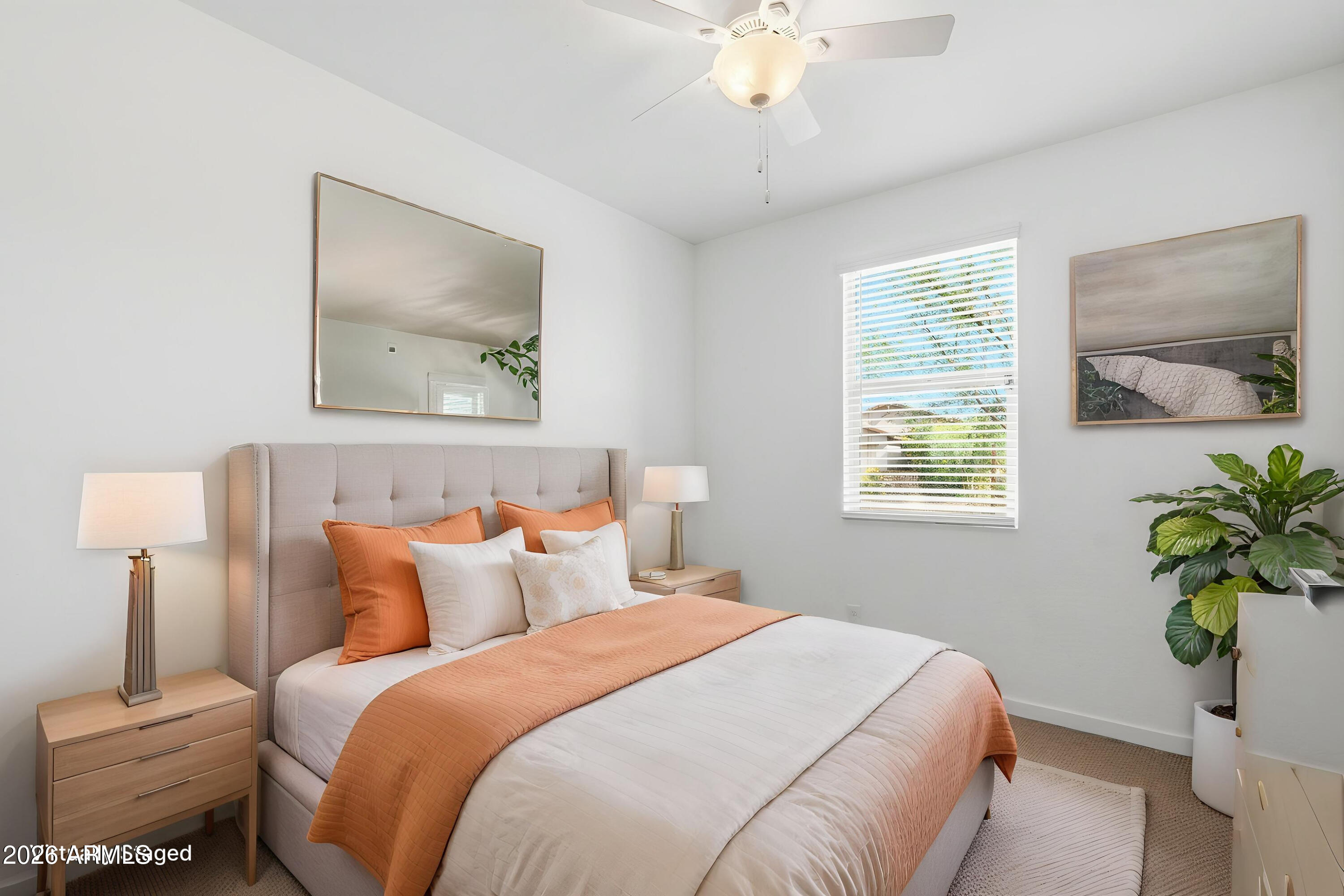 5621 West Notch Hill Road Laveen, AZ 85339 - Photo 26 of 49 a bedroom with a bed and a painting on the wall