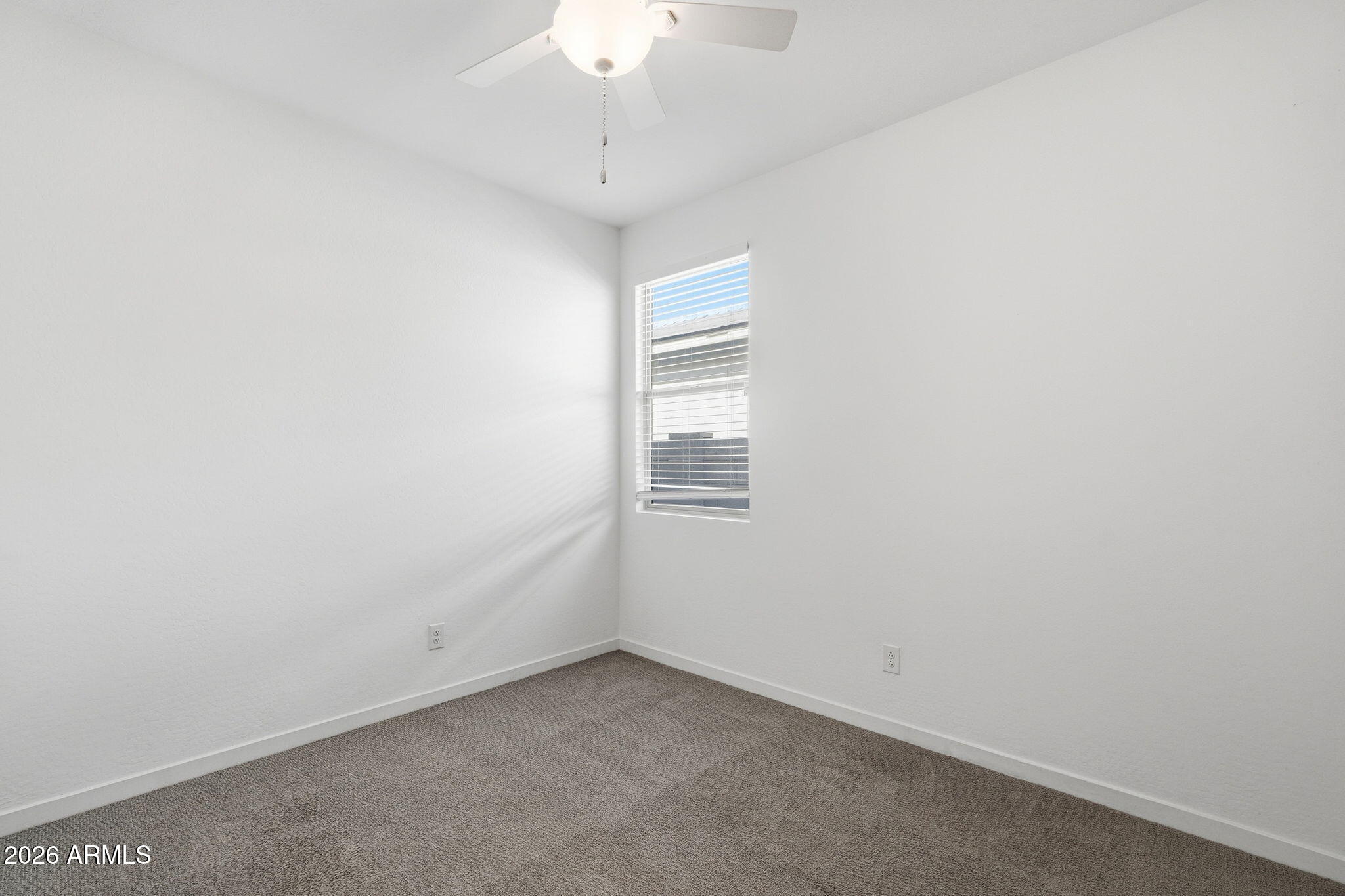 5621 West Notch Hill Road Laveen, AZ 85339 - Photo 28 of 49 a view of an empty room with a window