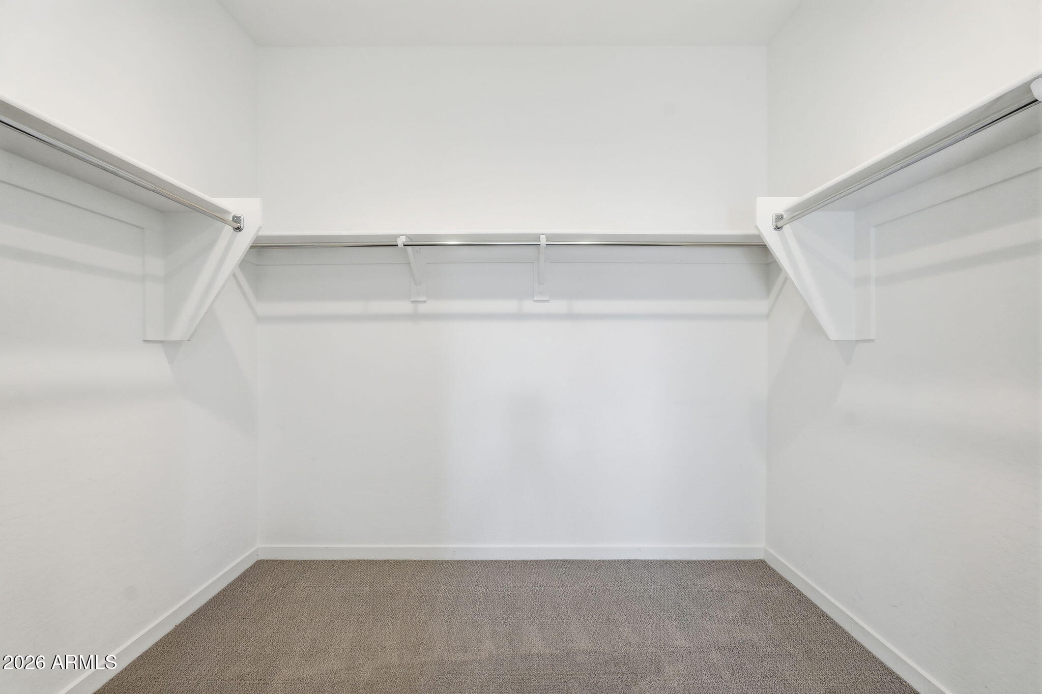 5621 West Notch Hill Road Laveen, AZ 85339 - Photo 30 of 49 a view of an empty walk in closet