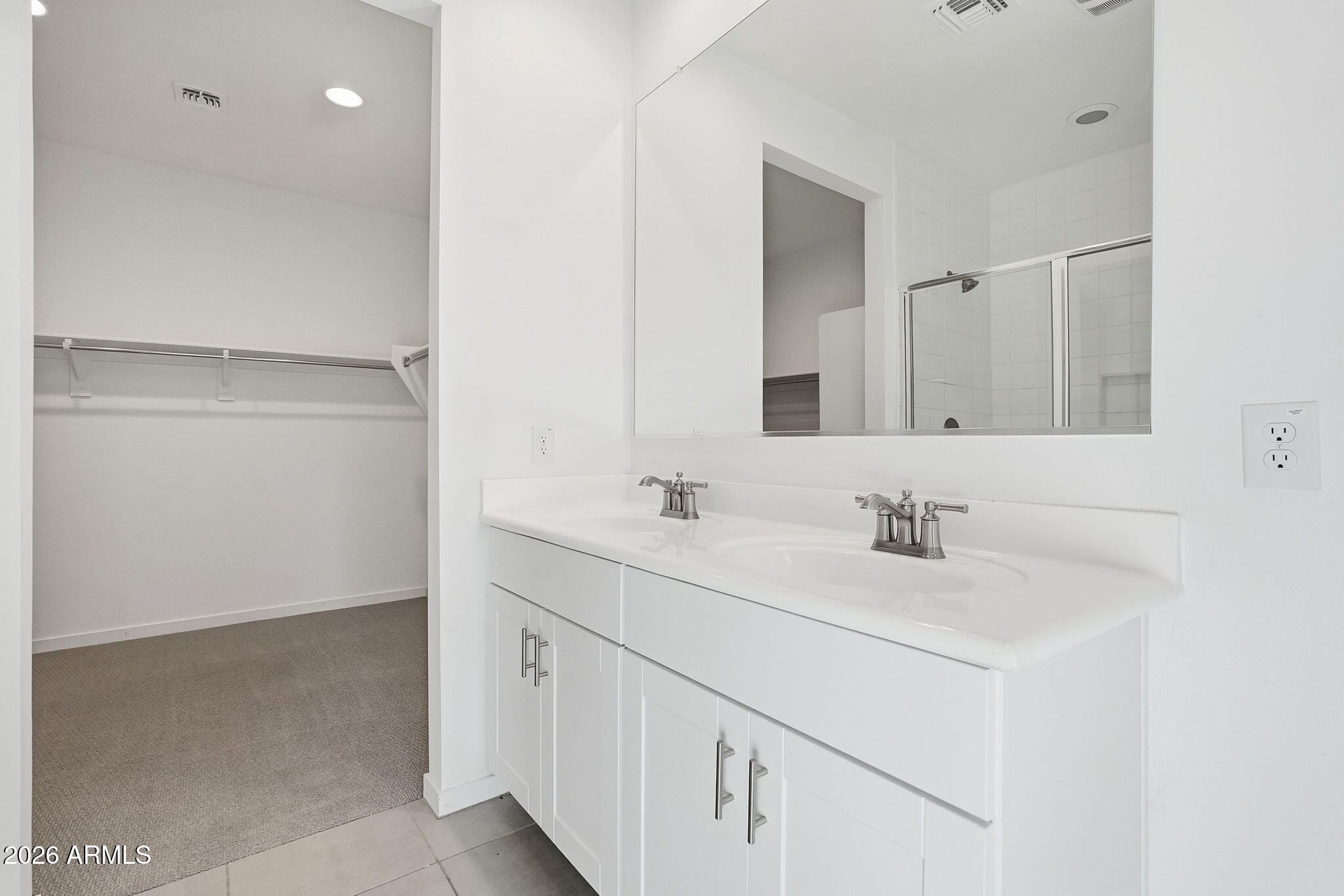 5621 West Notch Hill Road Laveen, AZ 85339 - Photo 31 of 49 a bathroom with a sink and a mirror