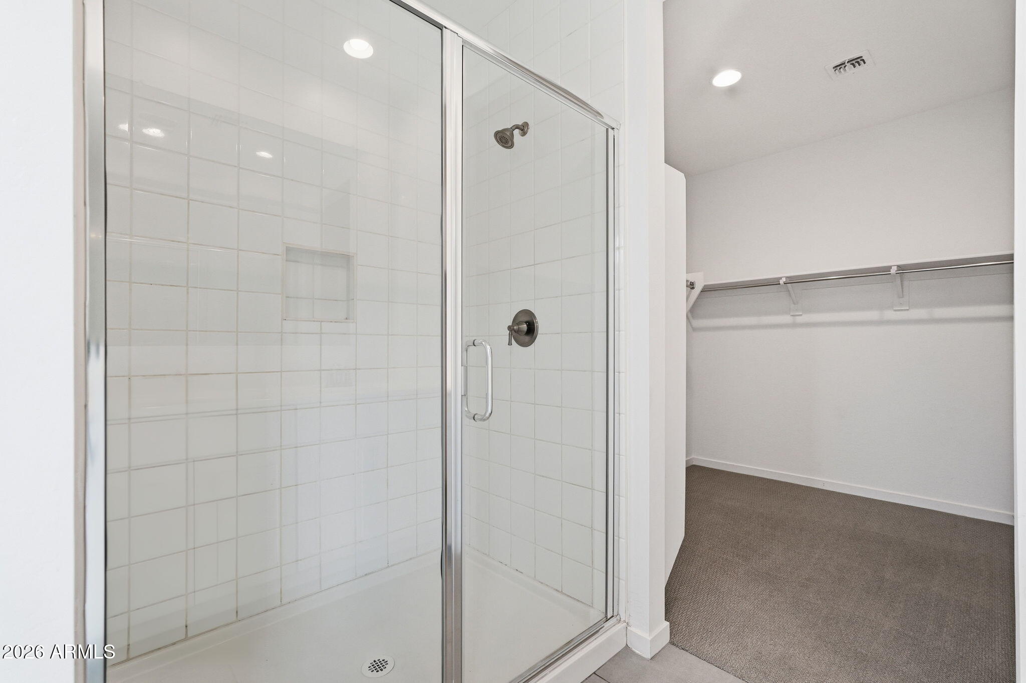 5621 West Notch Hill Road Laveen, AZ 85339 - Photo 32 of 49 a bathroom with a shower and a glass door