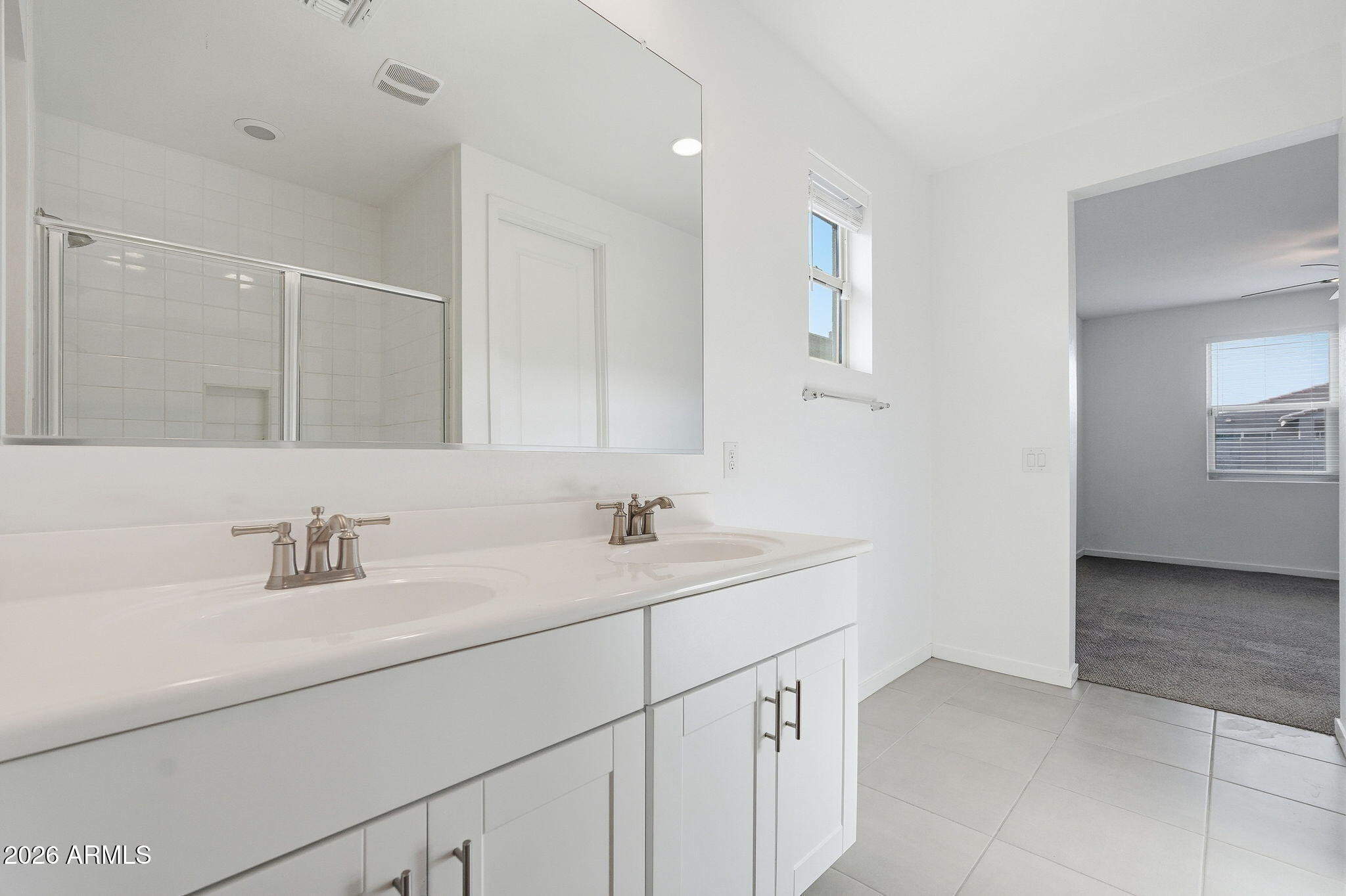 5621 West Notch Hill Road Laveen, AZ 85339 - Photo 33 of 49 a bathroom with a sink and a mirror