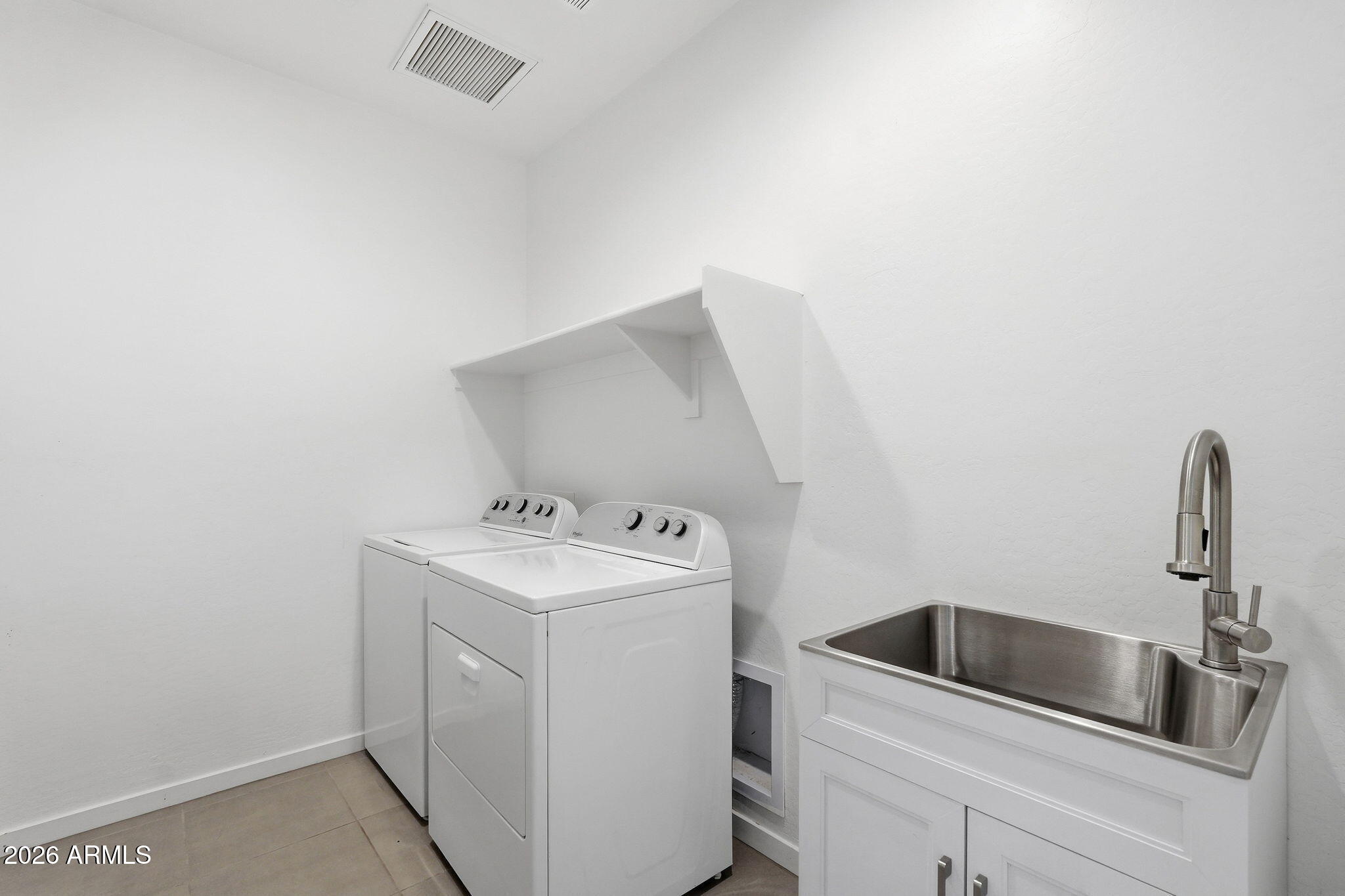 5621 West Notch Hill Road Laveen, AZ 85339 - Photo 35 of 49 a utility room with dryer and washer