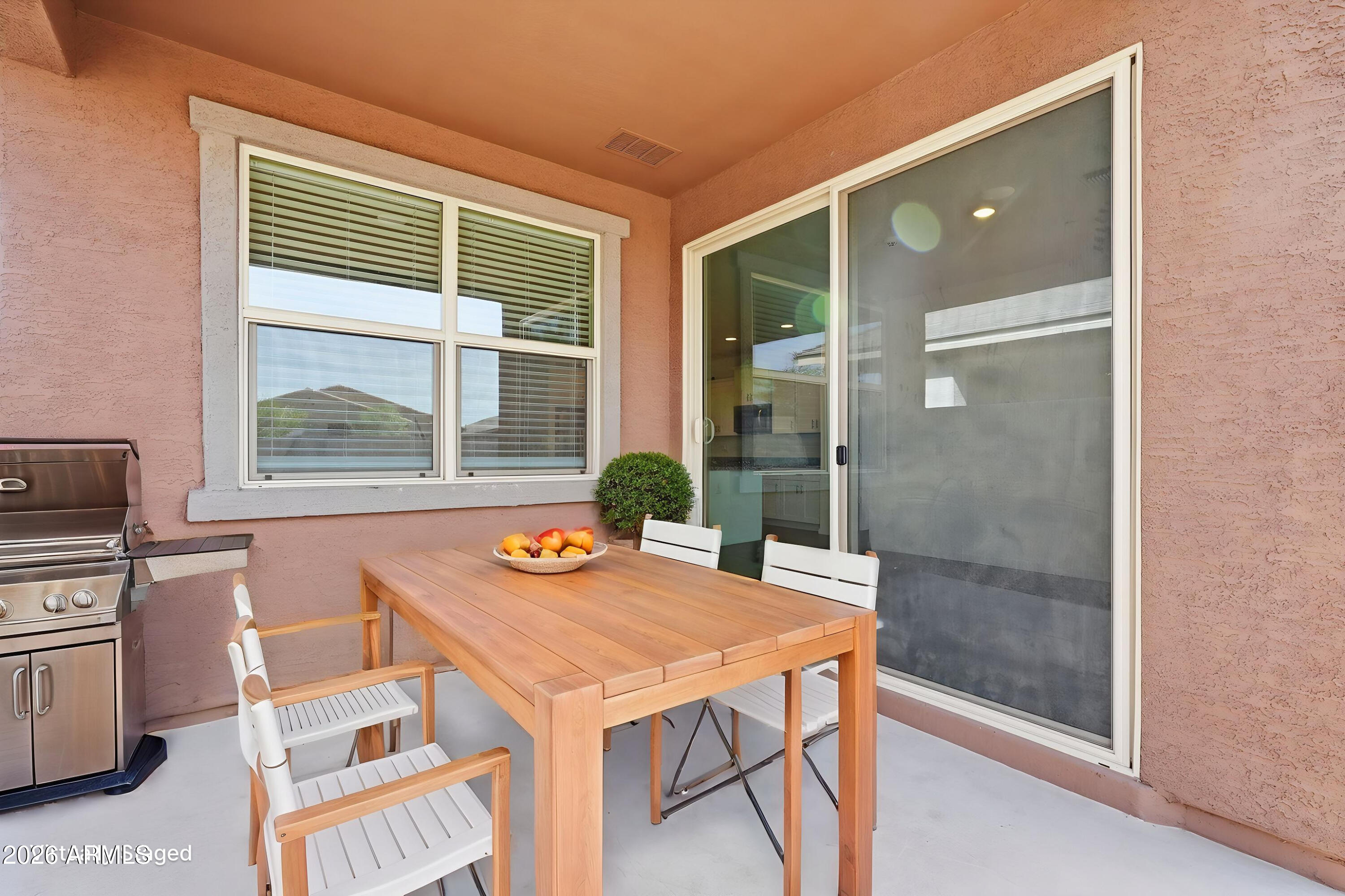 5621 West Notch Hill Road Laveen, AZ 85339 - Photo 40 of 49 a dining room with a table and chairs
