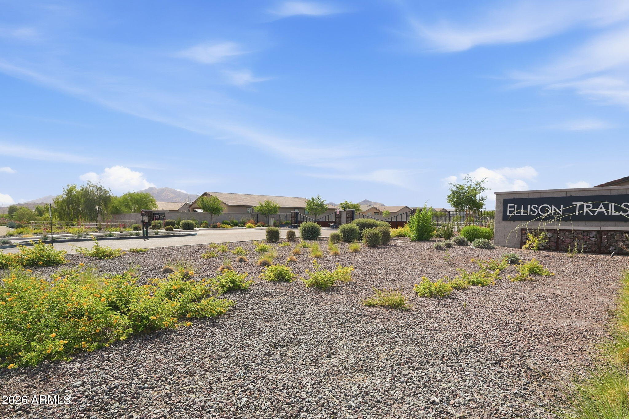 5621 West Notch Hill Road Laveen, AZ 85339 - Photo 46 of 49 a view of a lake with houses in the back