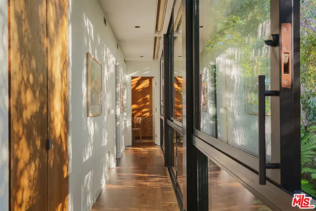 a view of a bathroom with a glass door