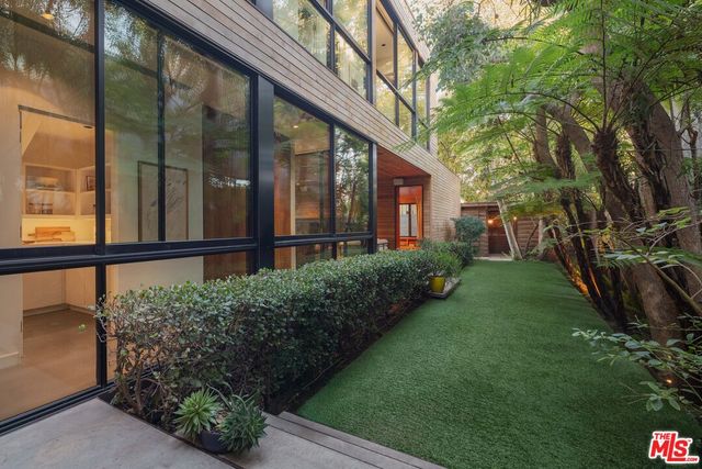 a view of a garden from a porch