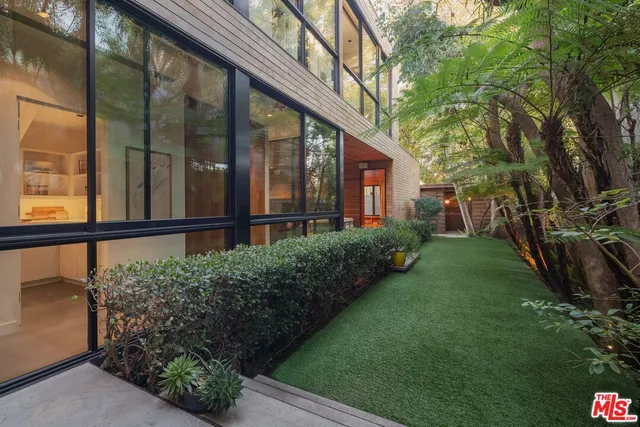 a view of a garden from a porch