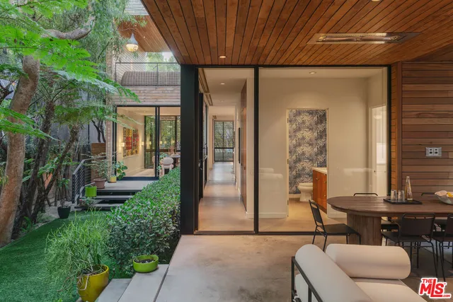 a house view with a outdoor space