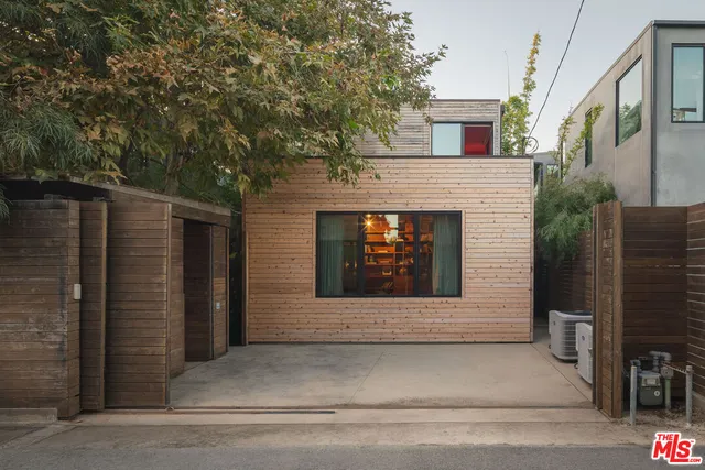 a front view of a house with a garage