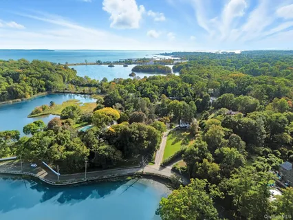 a view of a lake with a city