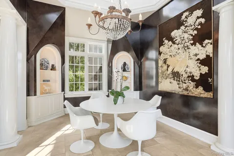 a view of a dining room with furniture window and outside view