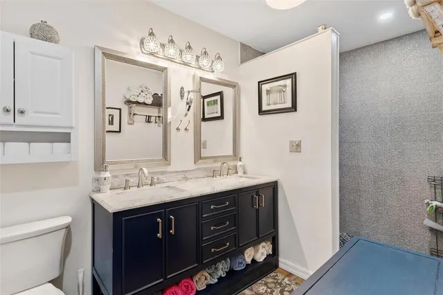 a bed room with a bed and a table