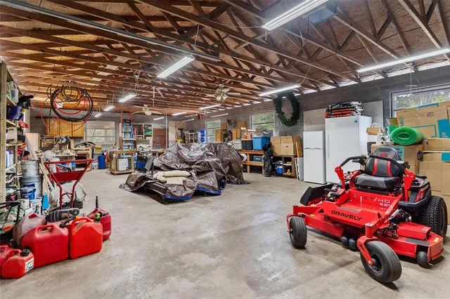 a aerial view of a house with a yard