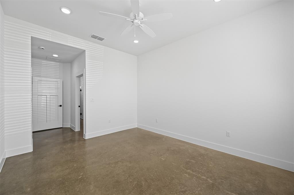 102 Cardinal Wds Granbury, TX 76049 - Photo 16 of 36 Spare room with finished concrete floors, a ceiling fan, and recessed lighting