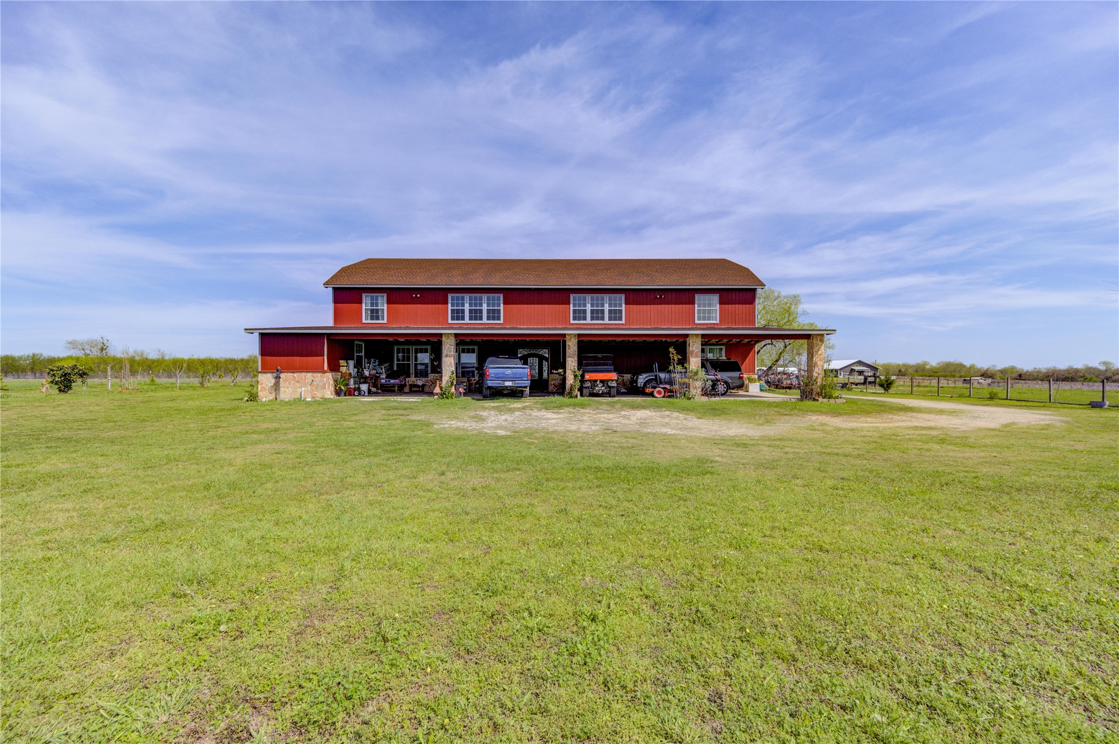 8570 Sunny Side Road Hempstead, TX 77445 - Photo 2 of 50 a view of a house with a big yard