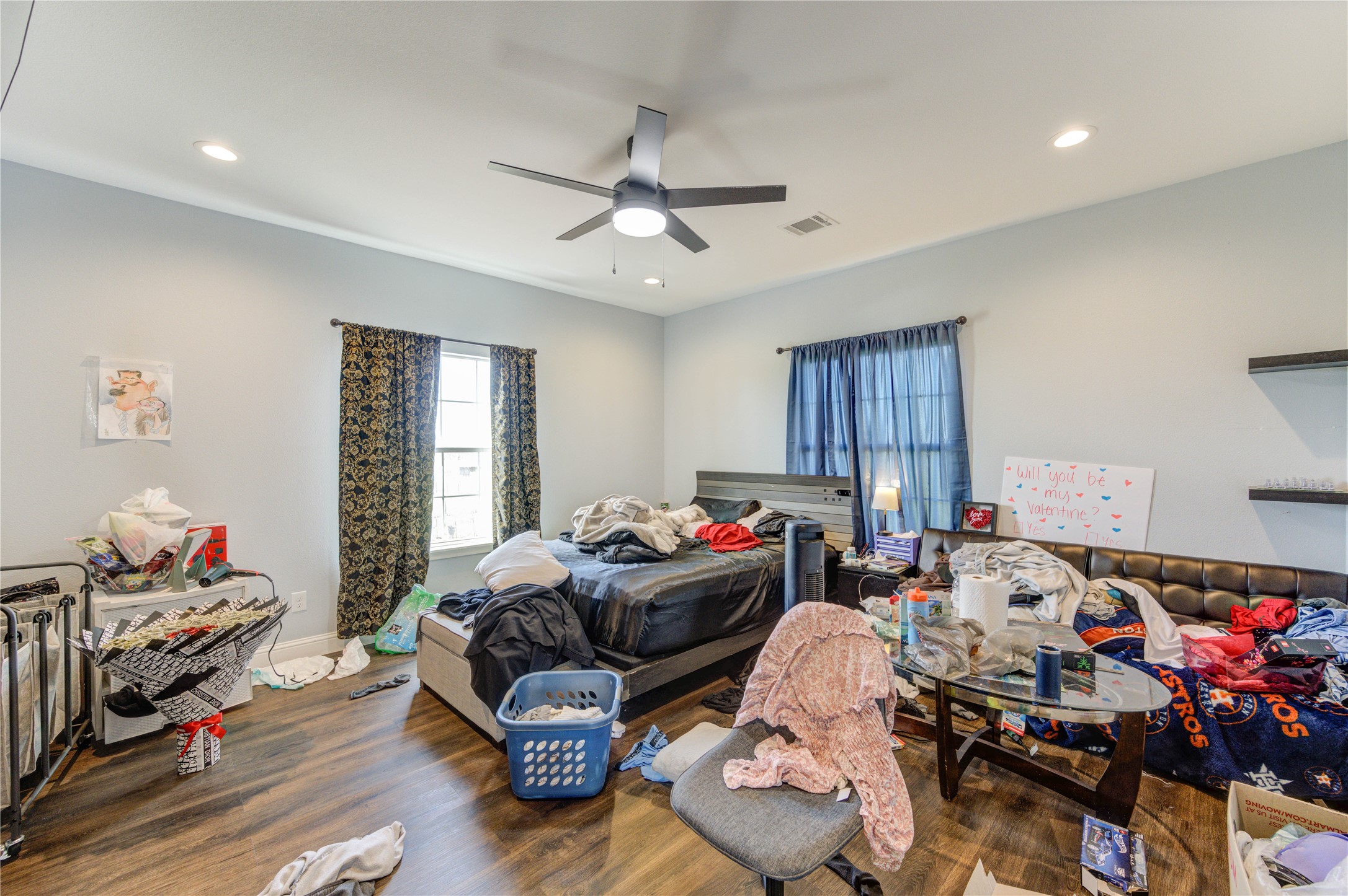8570 Sunny Side Road Hempstead, TX 77445 - Photo 28 of 50 a bedroom with furniture and a window