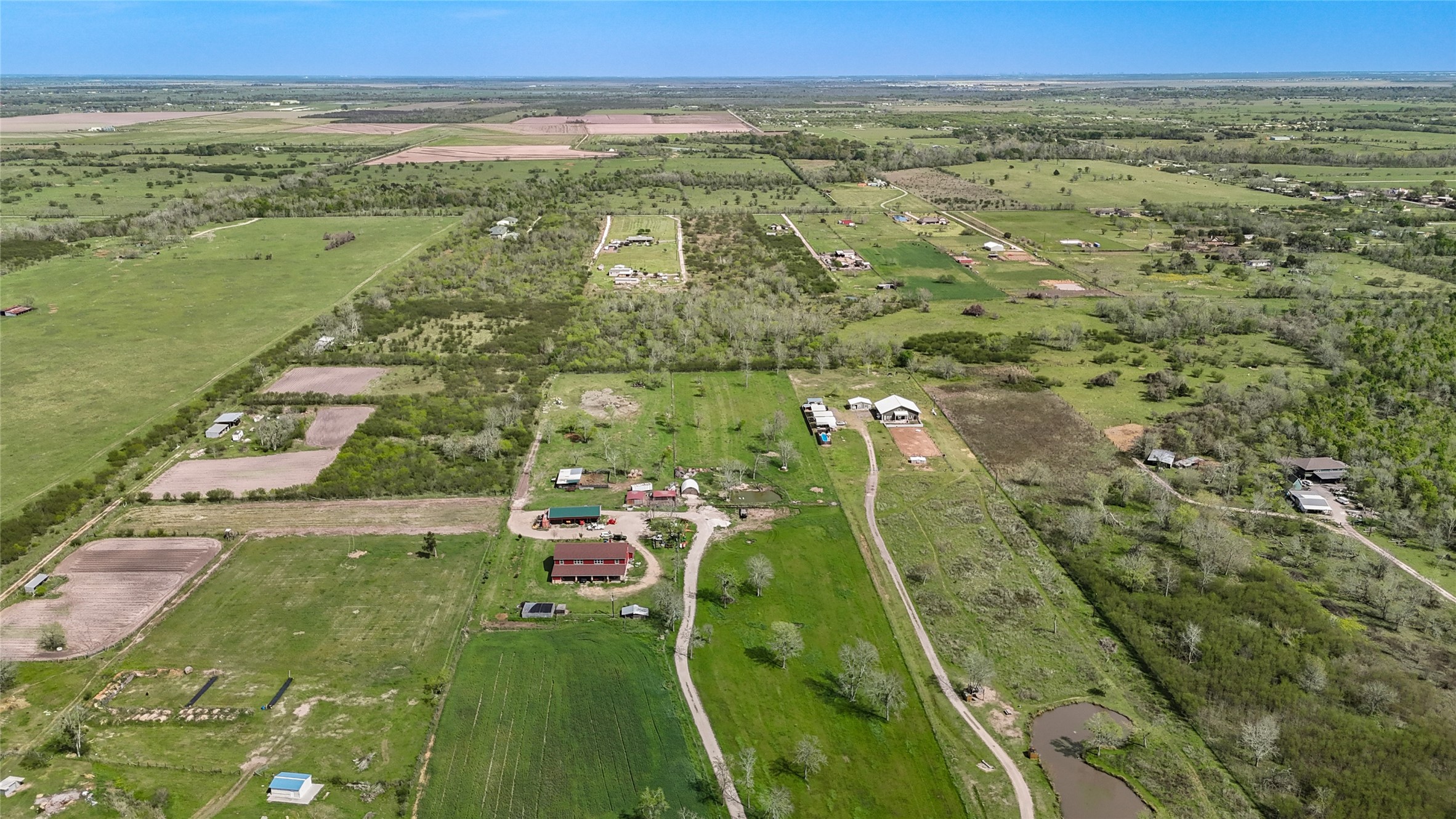 8570 Sunny Side Road Hempstead, TX 77445 - Photo 42 of 50 a view of an outdoor space and a lake view