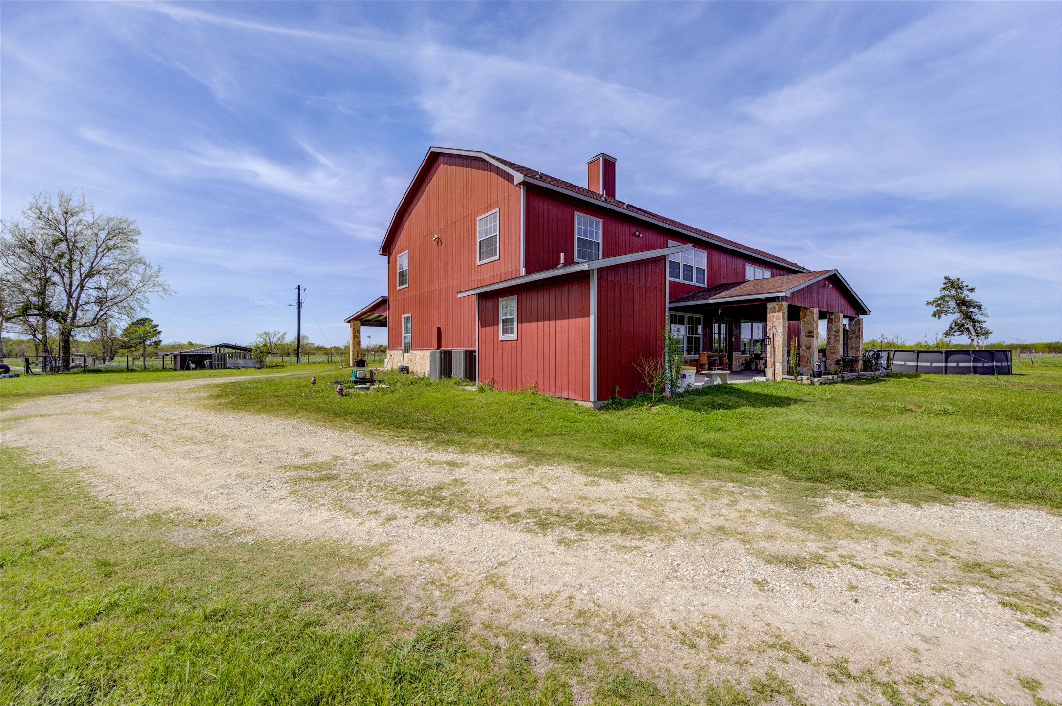 8570 Sunny Side Road Hempstead, TX 77445 - Photo 7 of 50 a front view of house with yard and green space