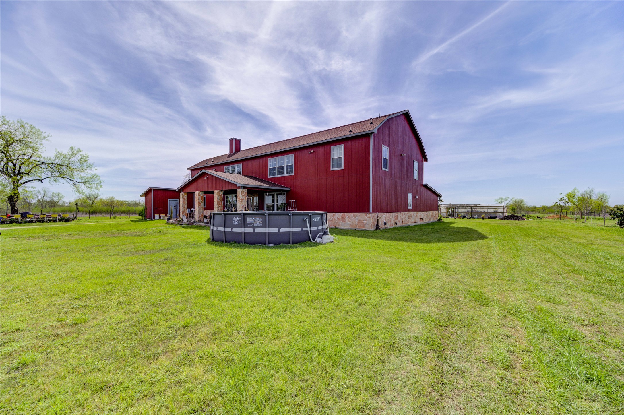 8570 Sunny Side Road Hempstead, TX 77445 - Photo 8 of 50 a view of a house with a big yard