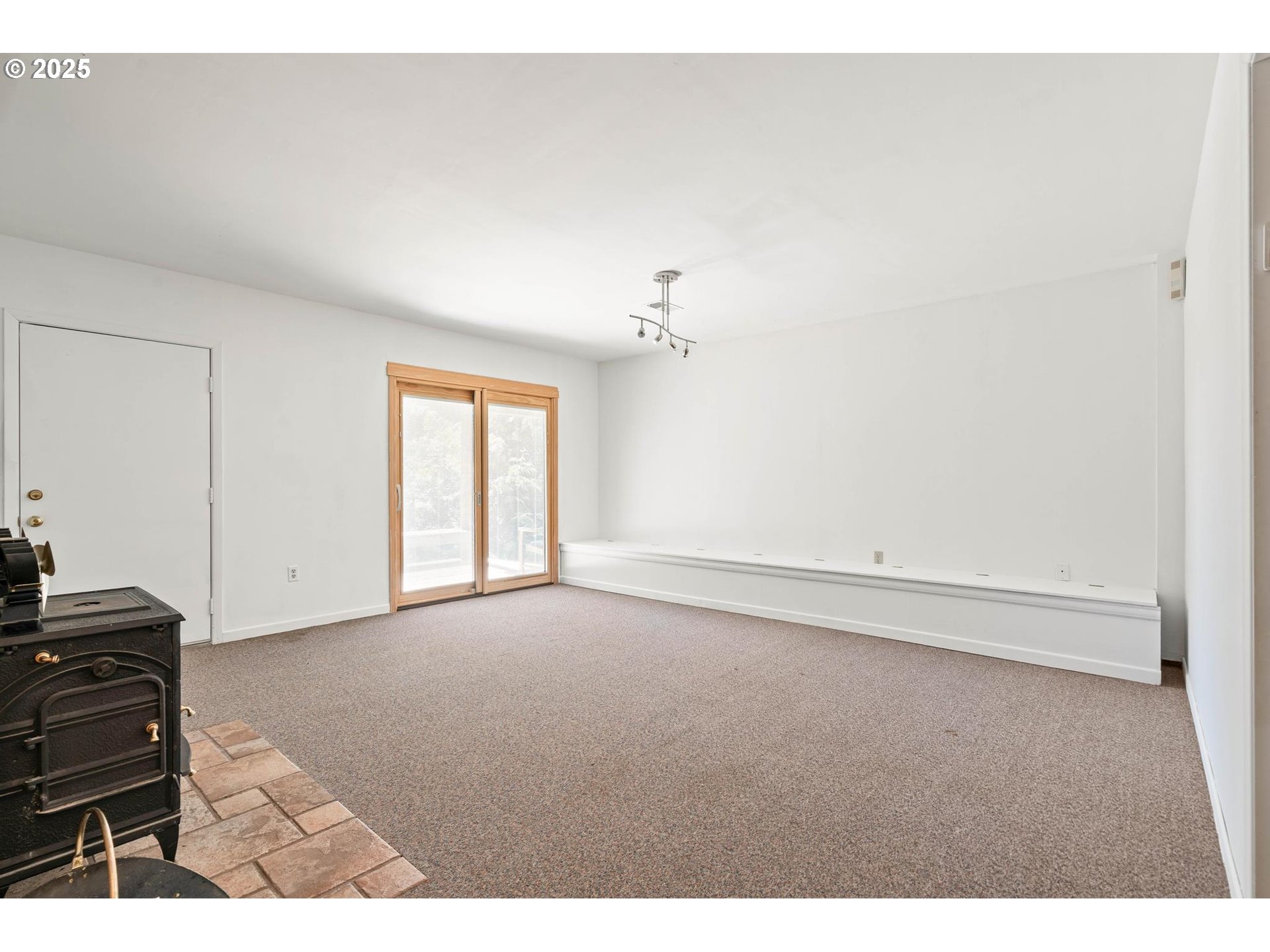 16448 Northwest McNamee Road Portland, OR 97231 - Photo 28 of 48 a view of empty room with windows
