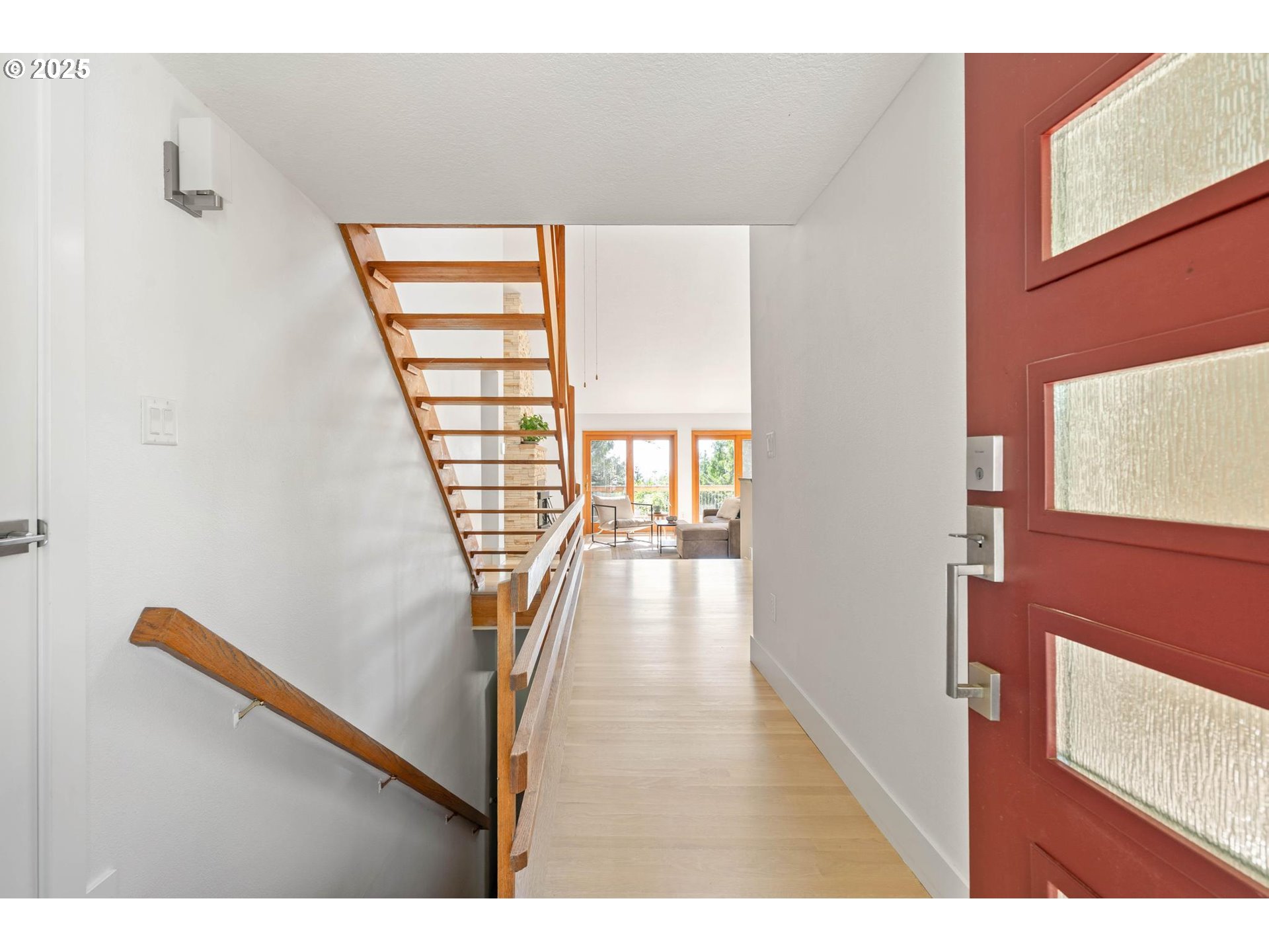 16448 Northwest McNamee Road Portland, OR 97231 - Photo 4 of 48 a view of entryway with wooden floor