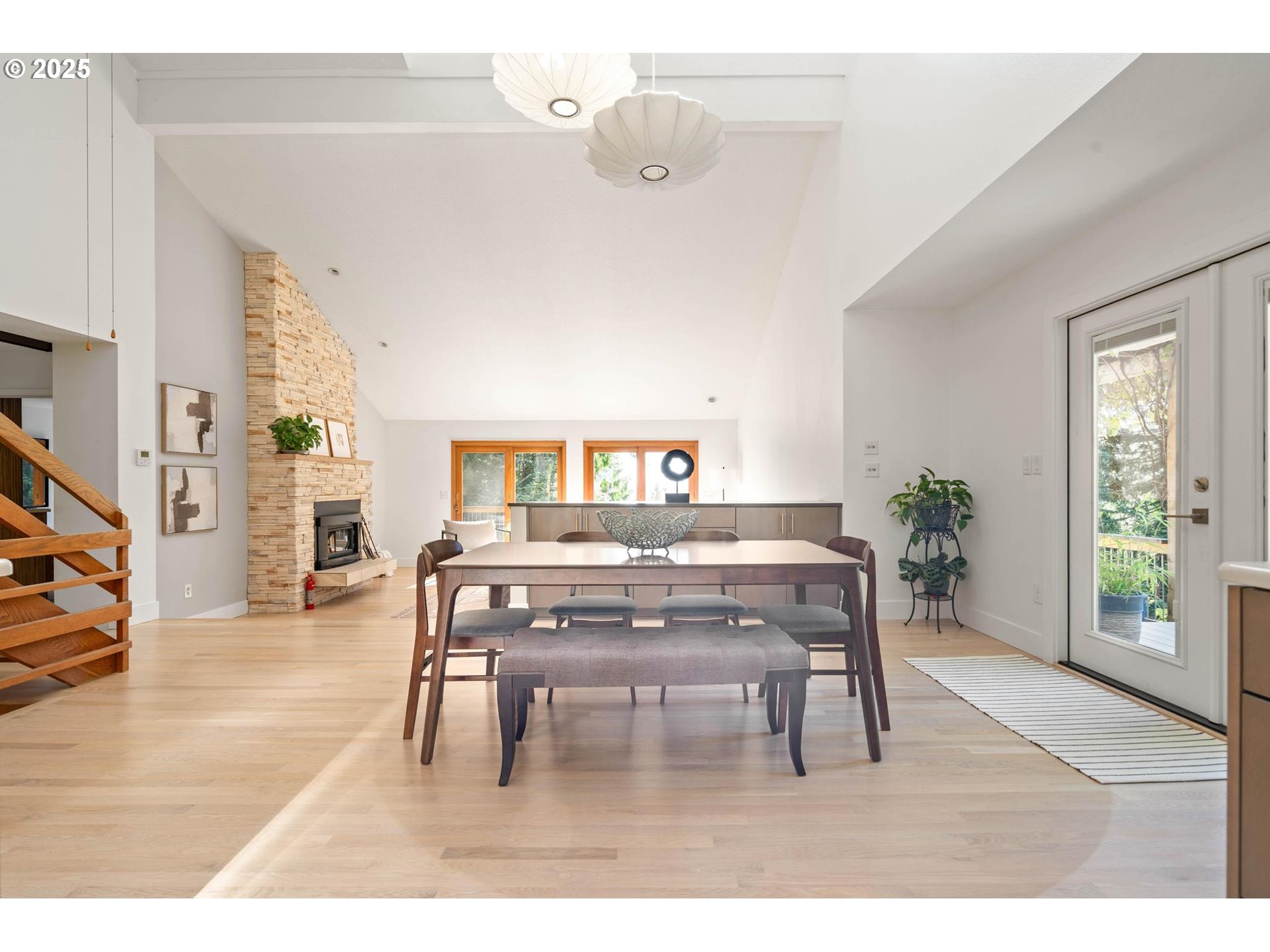 16448 Northwest McNamee Road Portland, OR 97231 - Photo 6 of 48 a view of a dining room with furniture and wooden floor