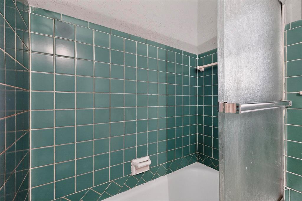 4508 Rutland Avenue Fort Worth, TX 76133 - Photo 24 of 36 a bathroom with a shower