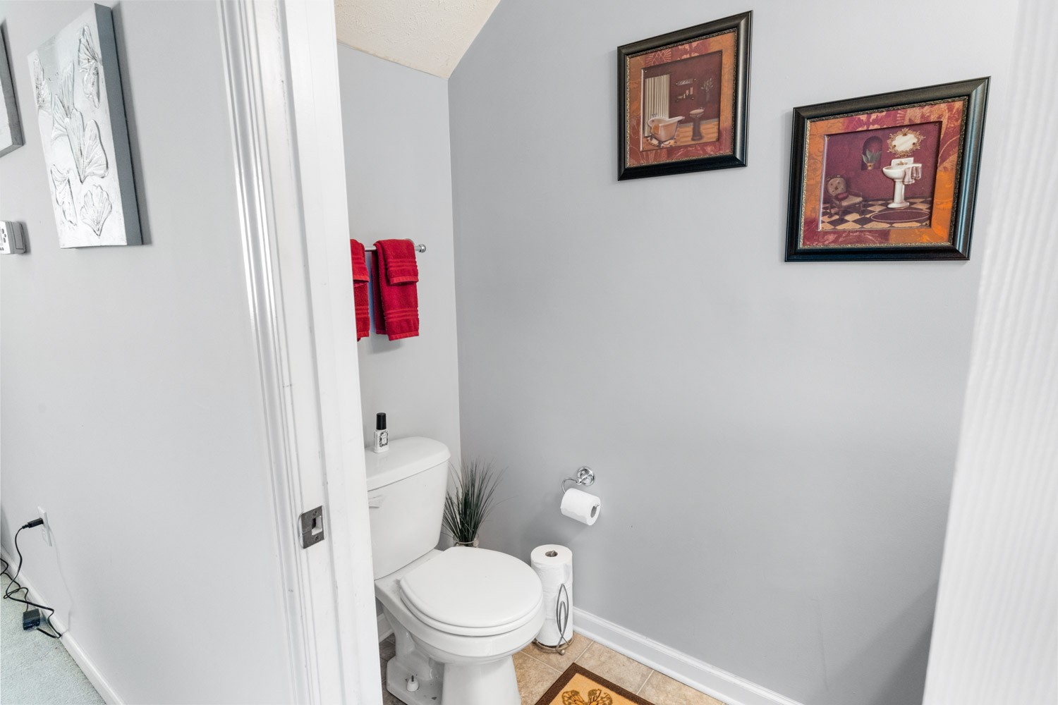 2018 Arum Court Spring Hill, TN 37174 - Photo 16 of 38 a bathroom with a toilet and a shower curtain