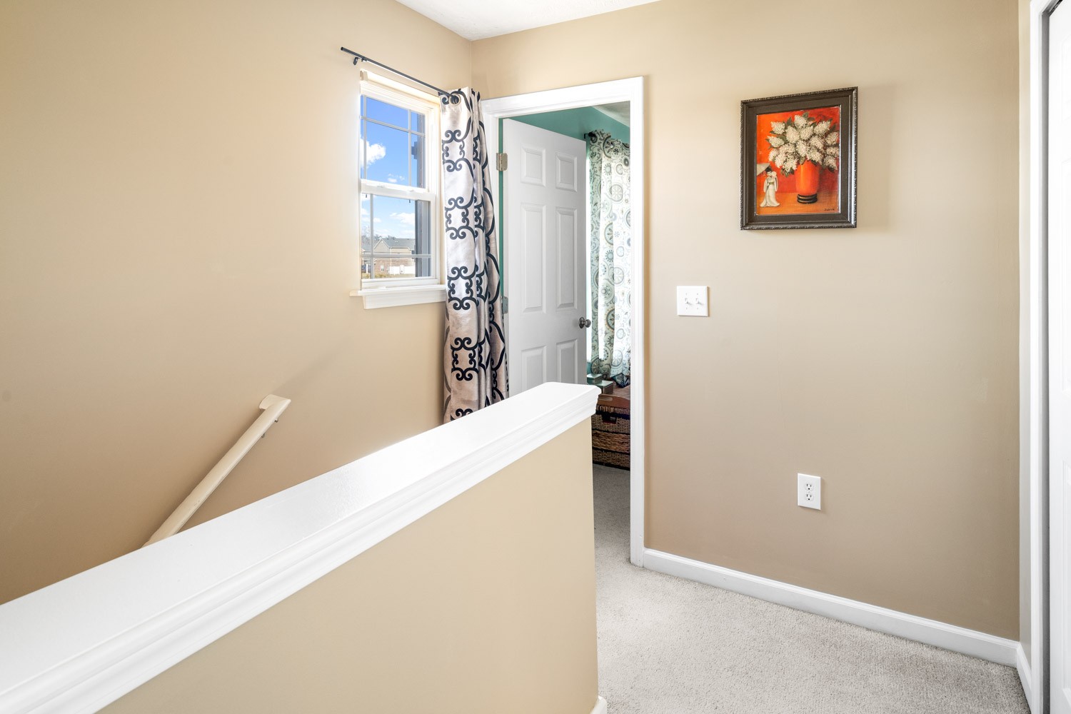 2018 Arum Court Spring Hill, TN 37174 - Photo 19 of 38 a view of a hallway with paintings on the wall