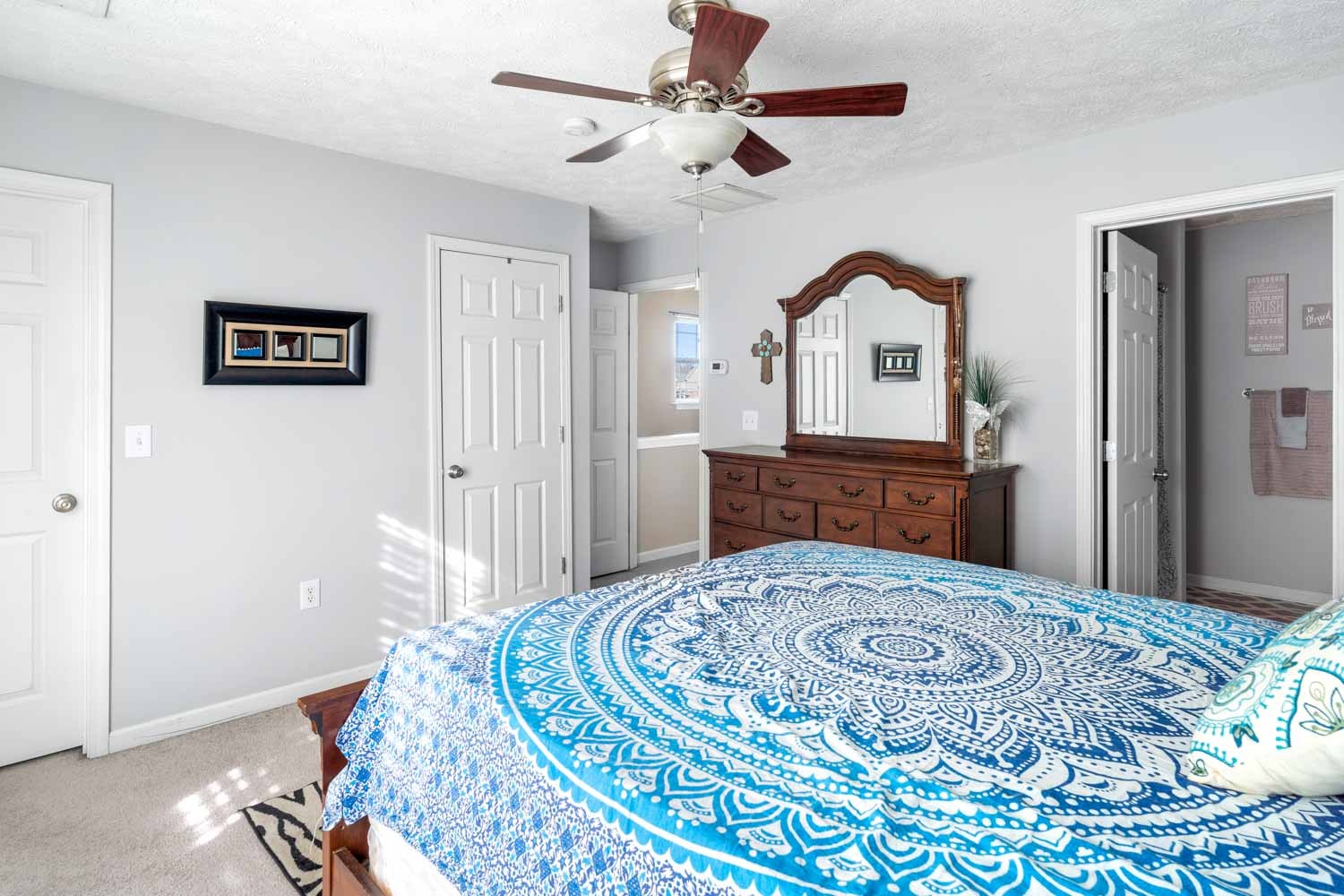 2018 Arum Court Spring Hill, TN 37174 - Photo 23 of 38 a bedroom with a bed and a dresser