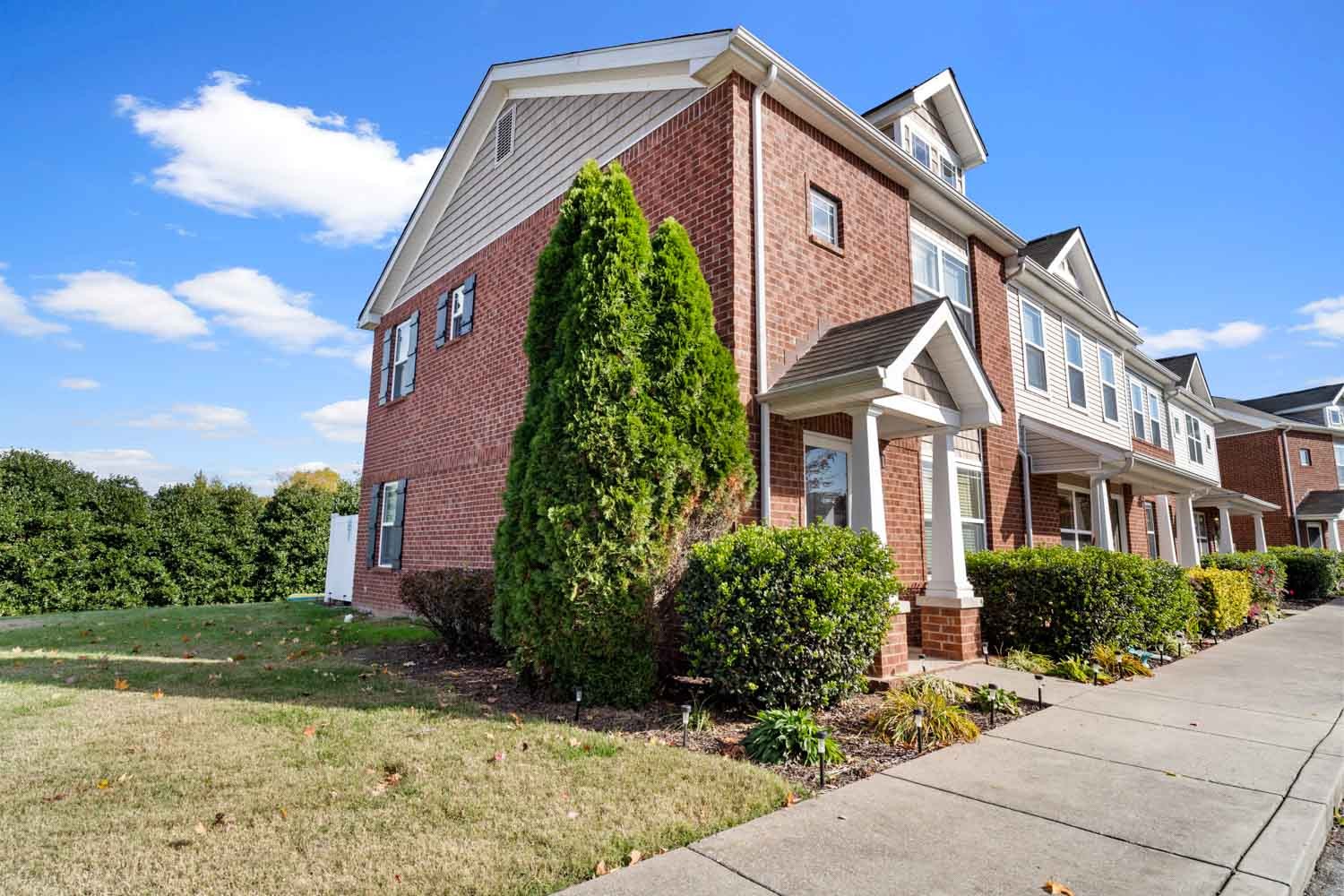 2018 Arum Court Spring Hill, TN 37174 - Photo 3 of 38 a front view of a house with garden