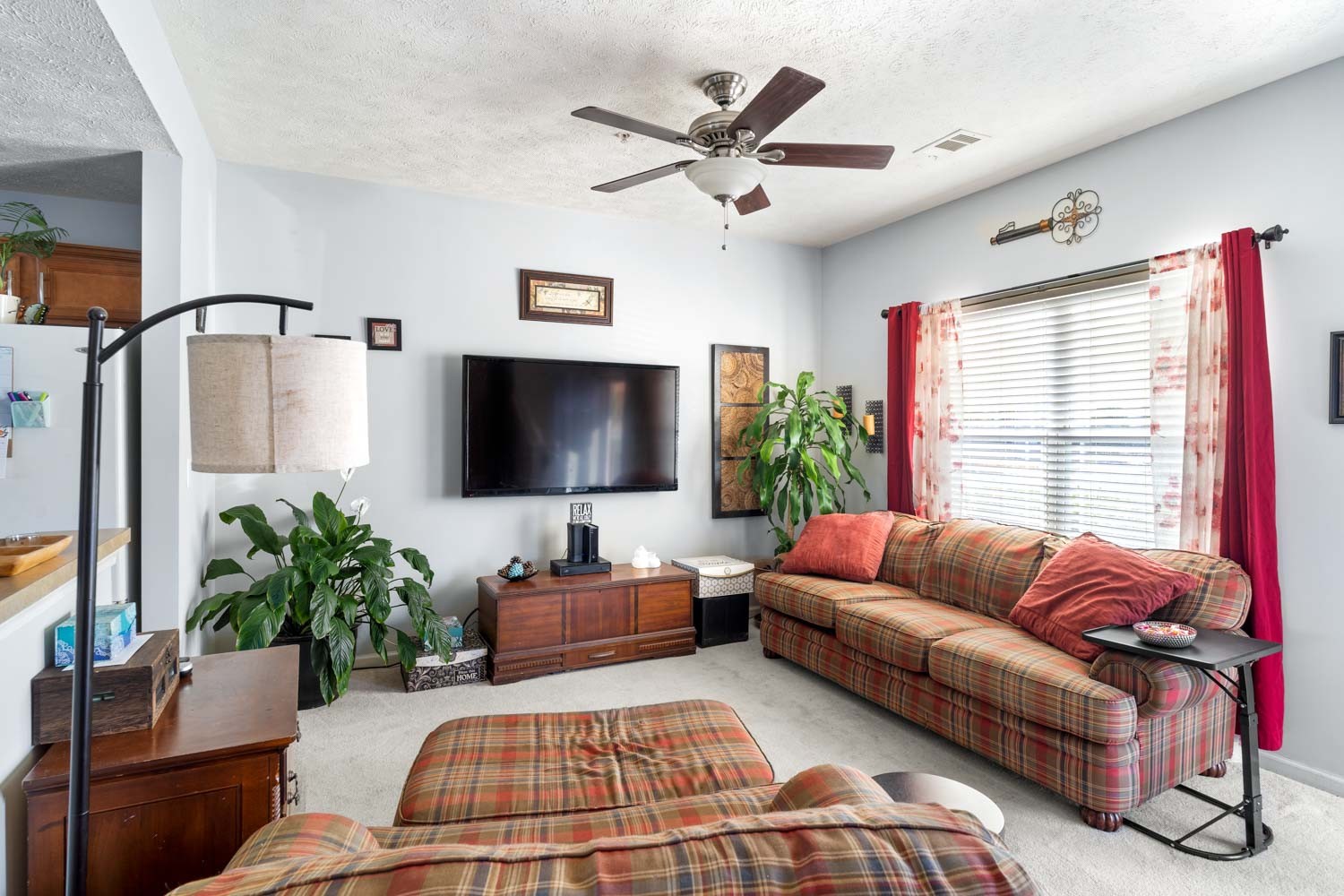 2018 Arum Court Spring Hill, TN 37174 - Photo 8 of 38 a living room with furniture or couch and a flat screen tv