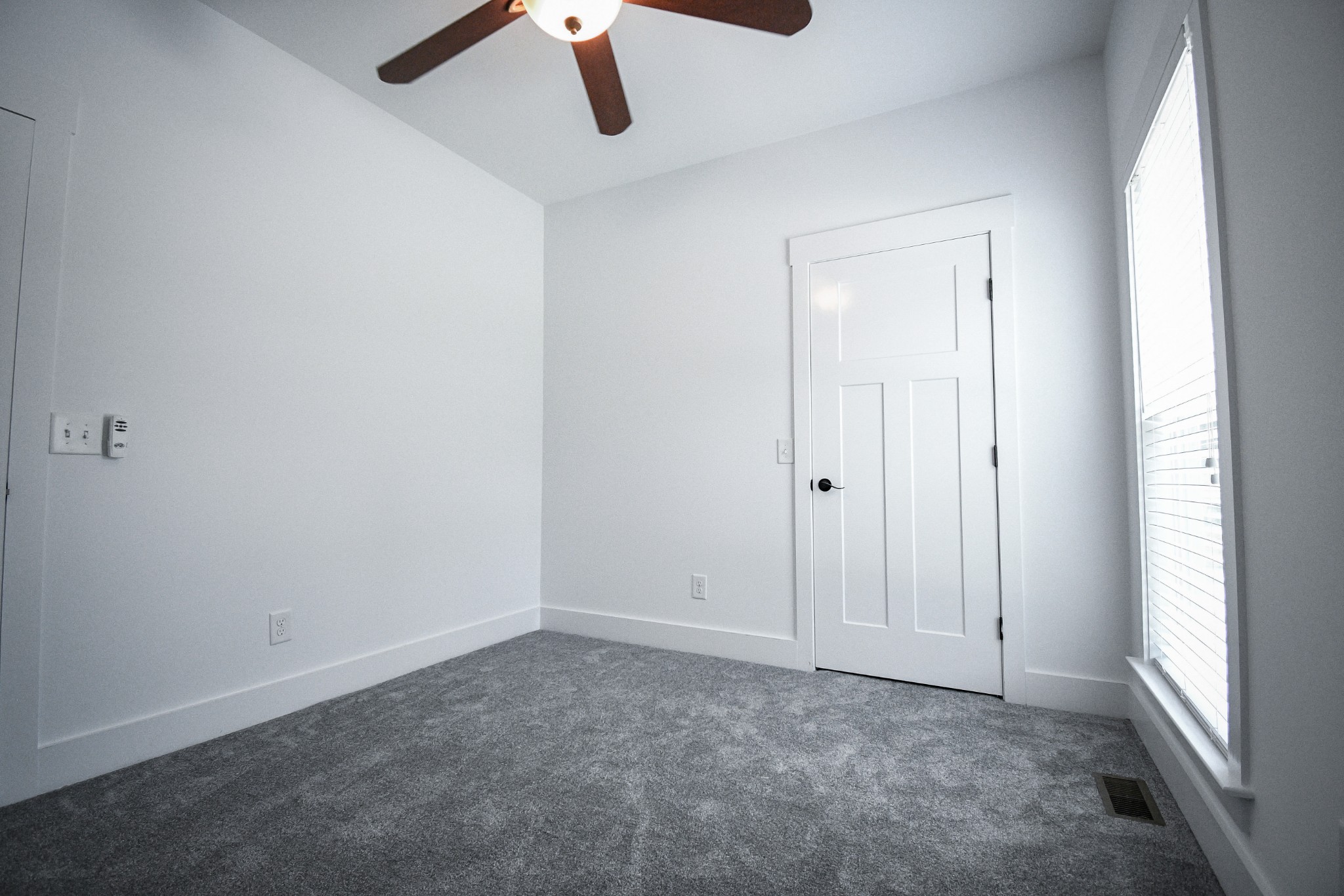 2848 Carpenter Bridge Road Columbia, TN 38401 - Photo 18 of 46 an empty room with a window and a ceiling fan