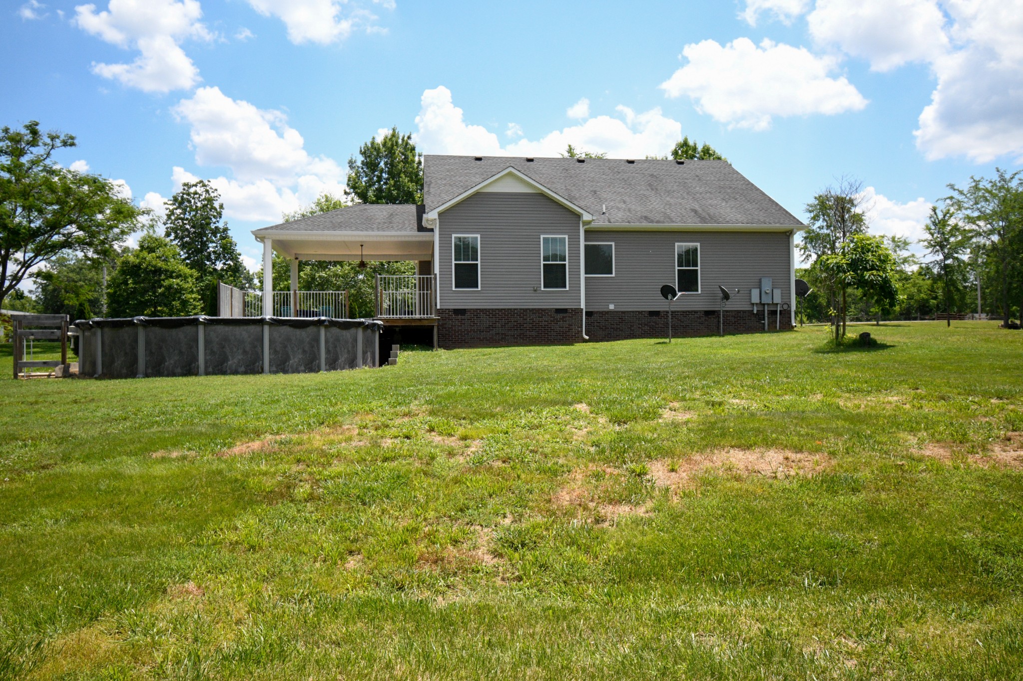 2848 Carpenter Bridge Road Columbia, TN 38401 - Photo 25 of 46 a view of a house with a yard and sitting area