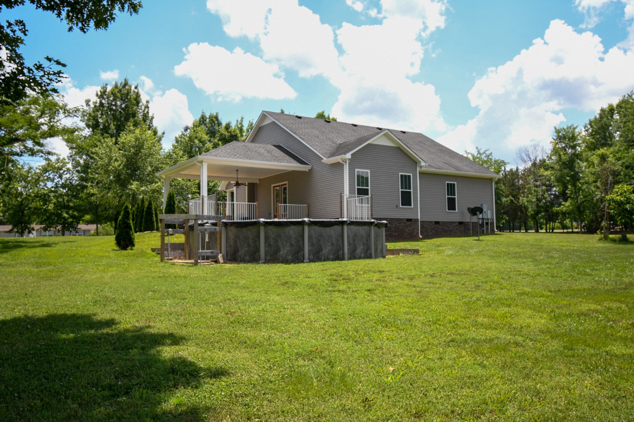 2848 Carpenter Bridge Road Columbia, TN 38401 - Photo 26 of 46 a front view of a house with a yard and trees