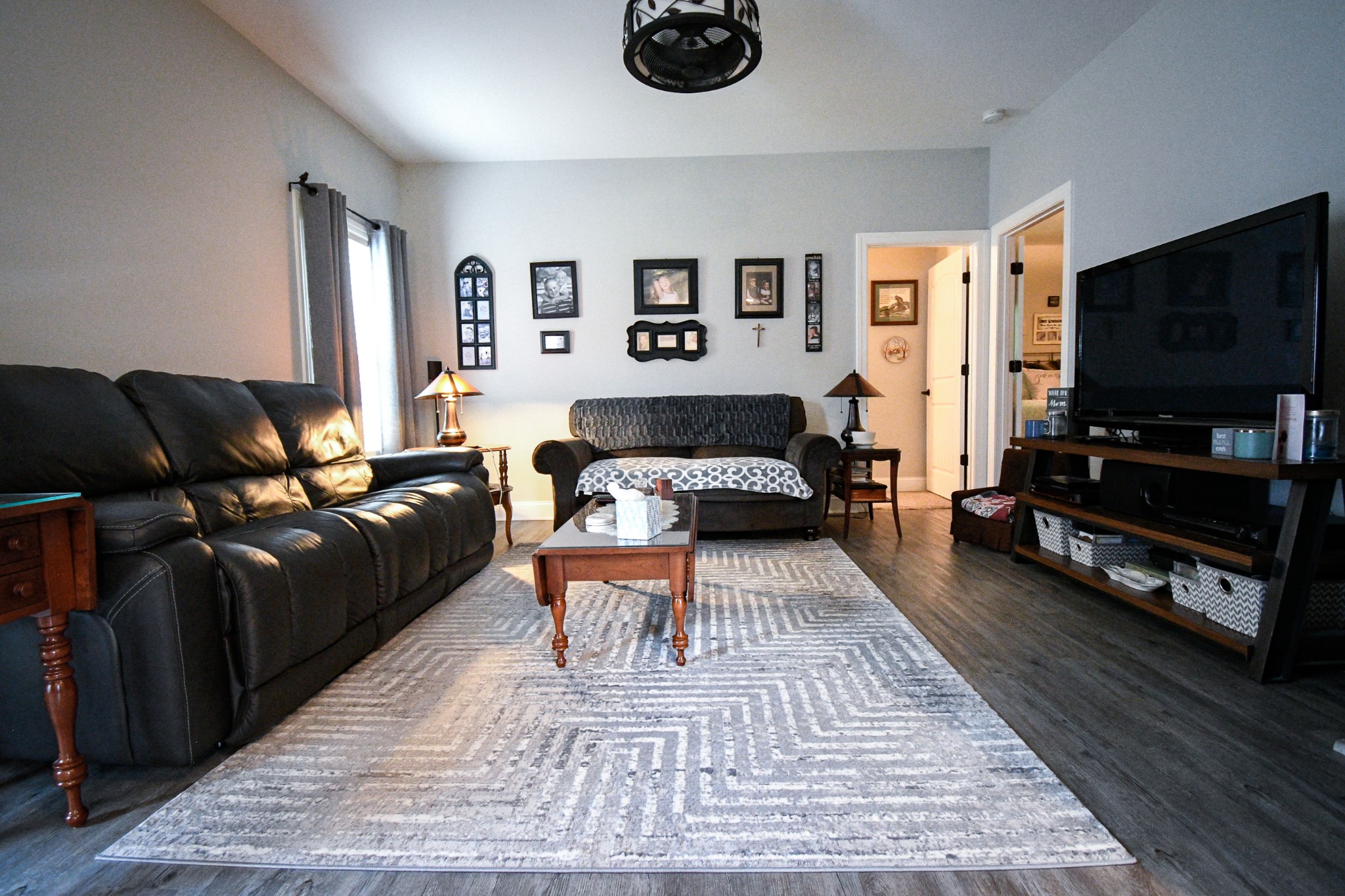 2848 Carpenter Bridge Road Columbia, TN 38401 - Photo 34 of 46 a living room with furniture and a flat screen tv