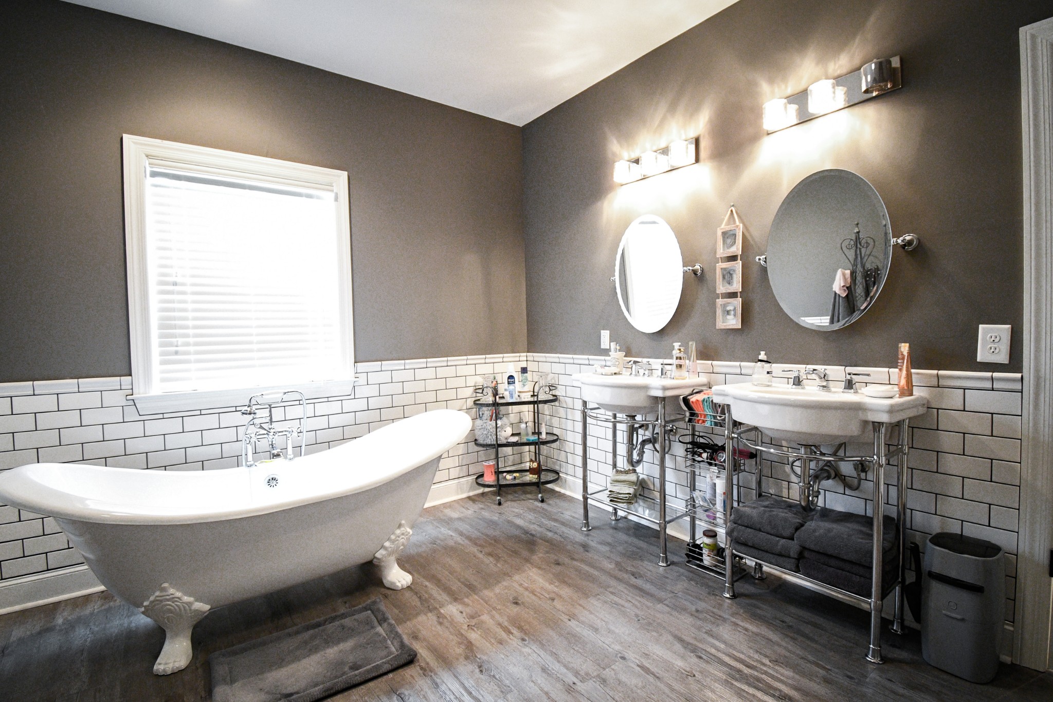 2848 Carpenter Bridge Road Columbia, TN 38401 - Photo 41 of 46 a bathroom with a double vanity sink mirror and a bathtub