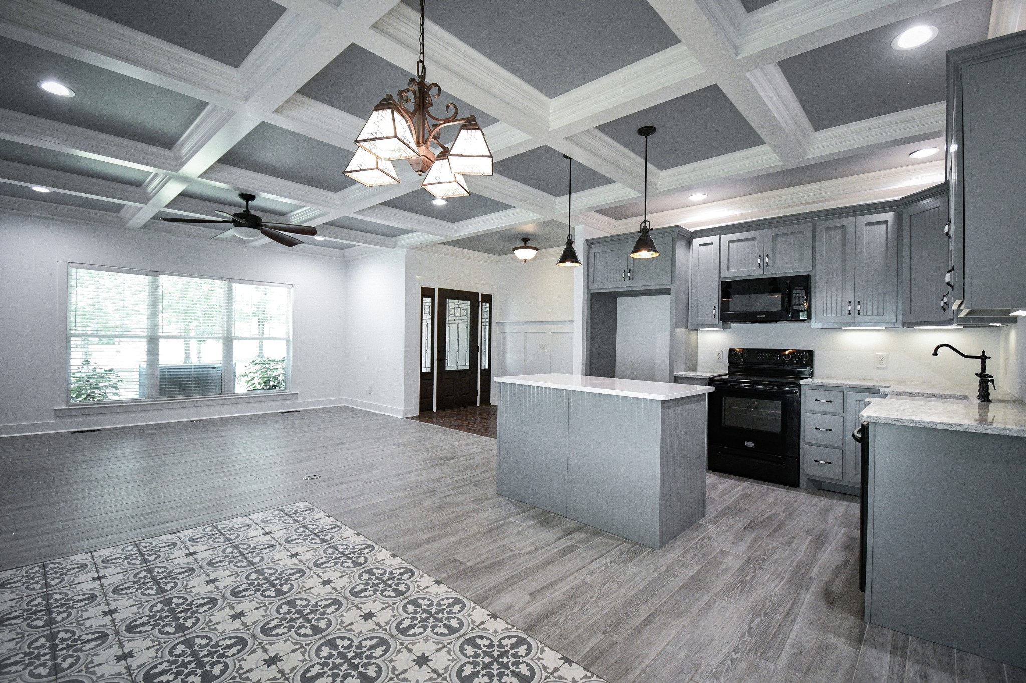 2848 Carpenter Bridge Road Columbia, TN 38401 - Photo 9 of 46 a large kitchen with kitchen island a counter space a sink a window stainless steel appliances and cabinets